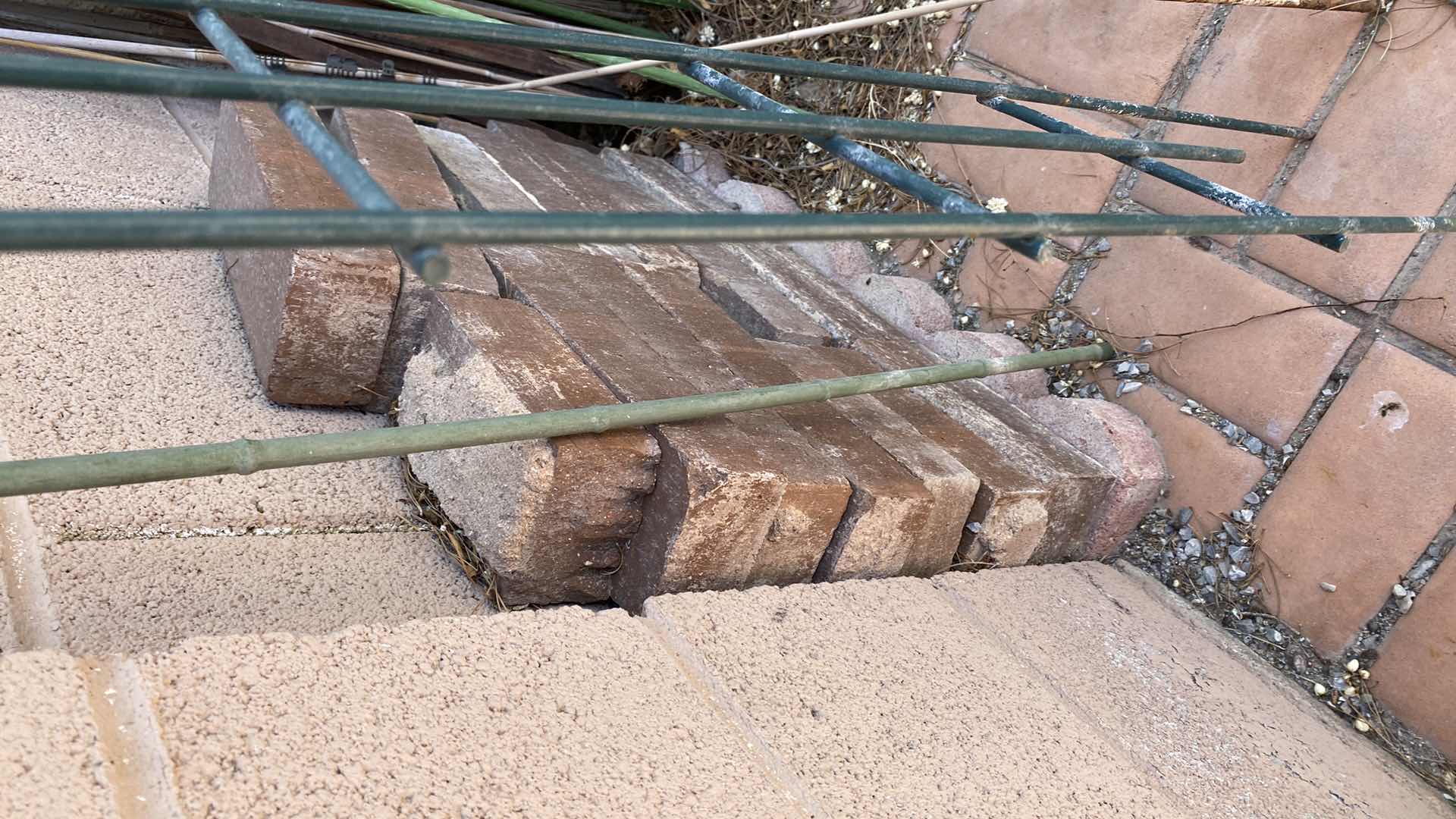 Photo 1 of GARDEN SUPPLIES TOMATO CAGES FENCE POLES FOR VINES SCALLOPED BRICK EDGING AND BRICKS