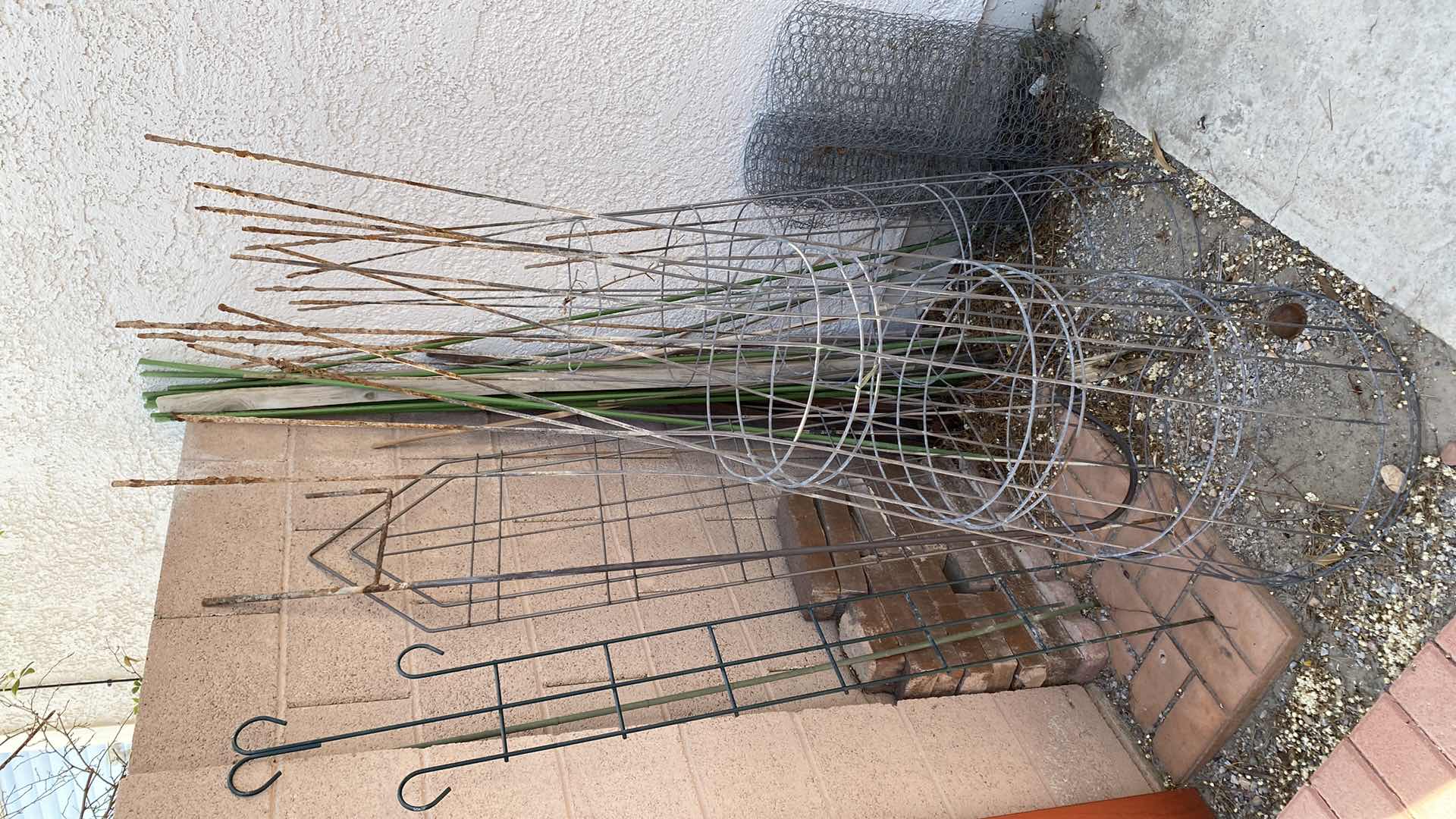 Photo 1 of GARDEN SUPPLIES TOMATO CAGES FENCE POLES FOR VINES SCALLOPED BRICK EDGING AND BRICKS