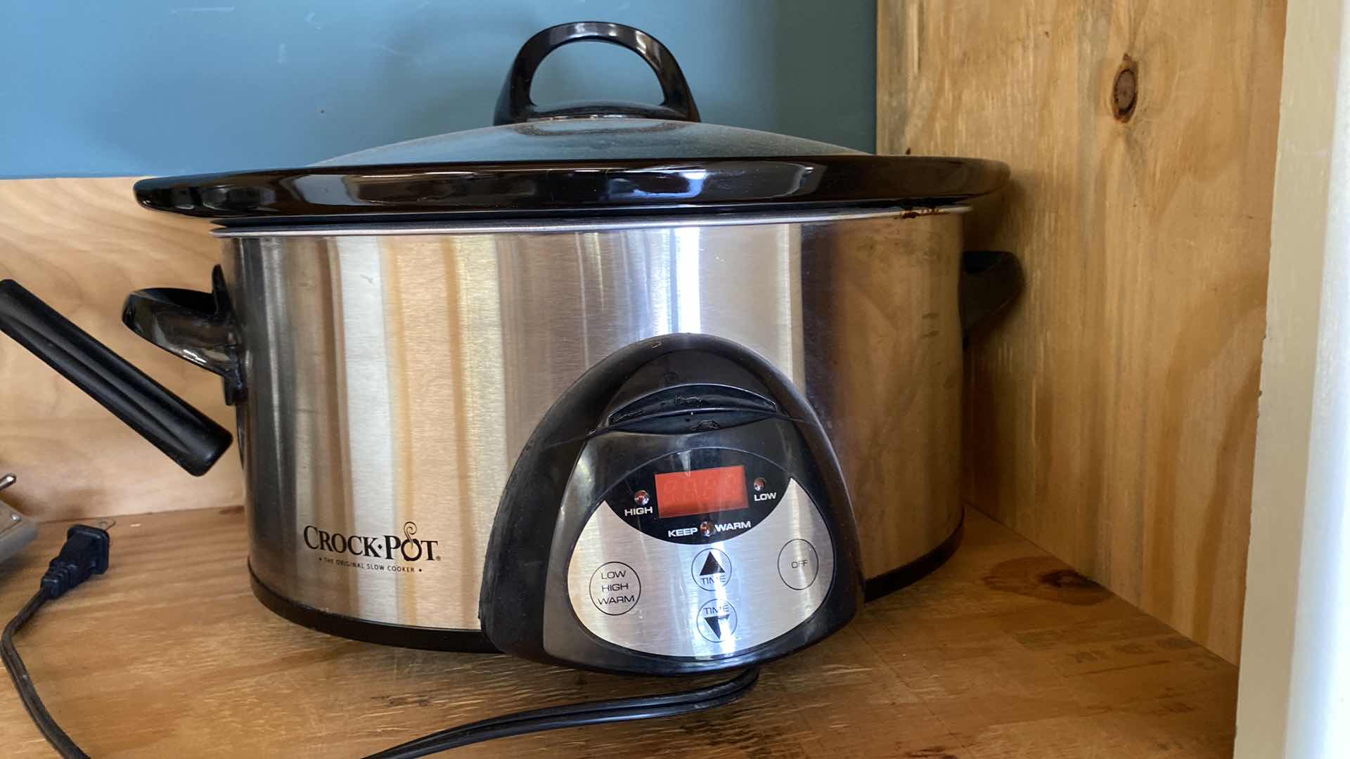 Photo 1 of CONTENTS OF SHELF GARAGE CABINET CROCK-POT AND WAFFLE MAKER