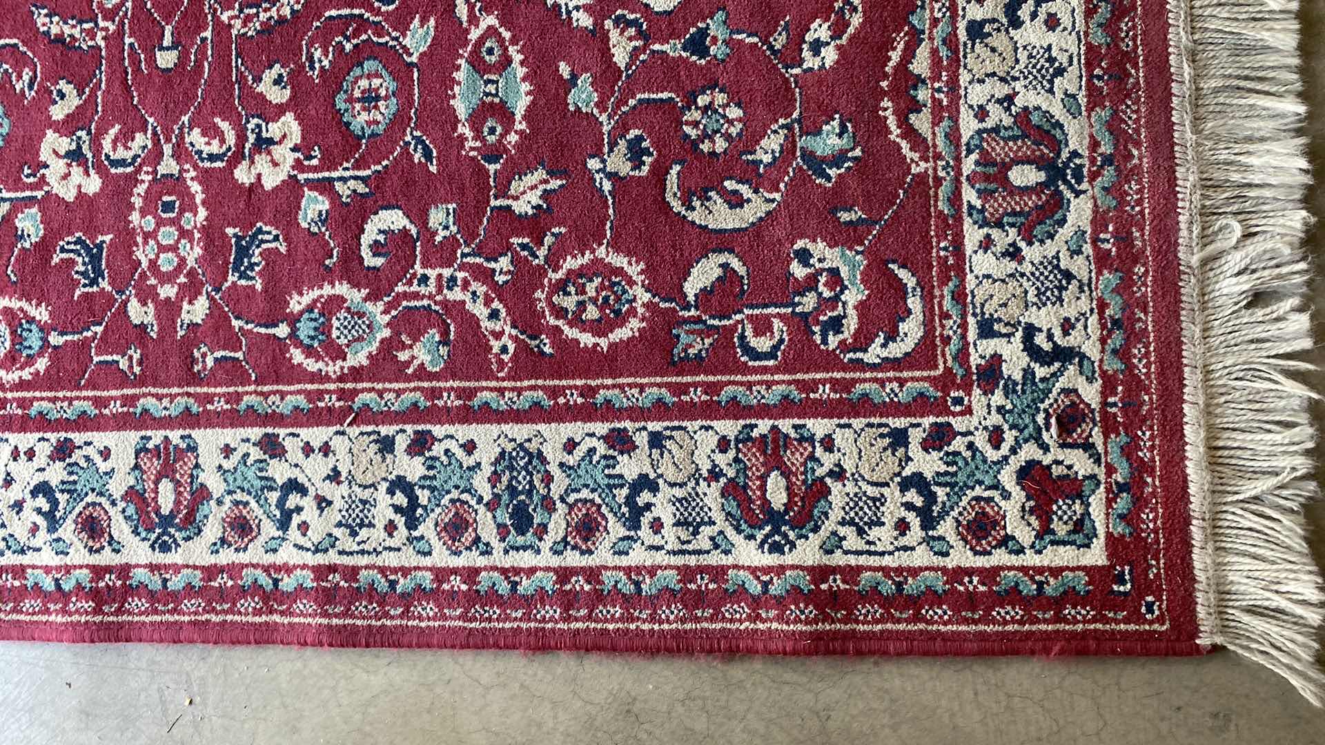 Photo 1 of BURGUNDY BLUE AND CREAM AREA RUG 45” X 65”