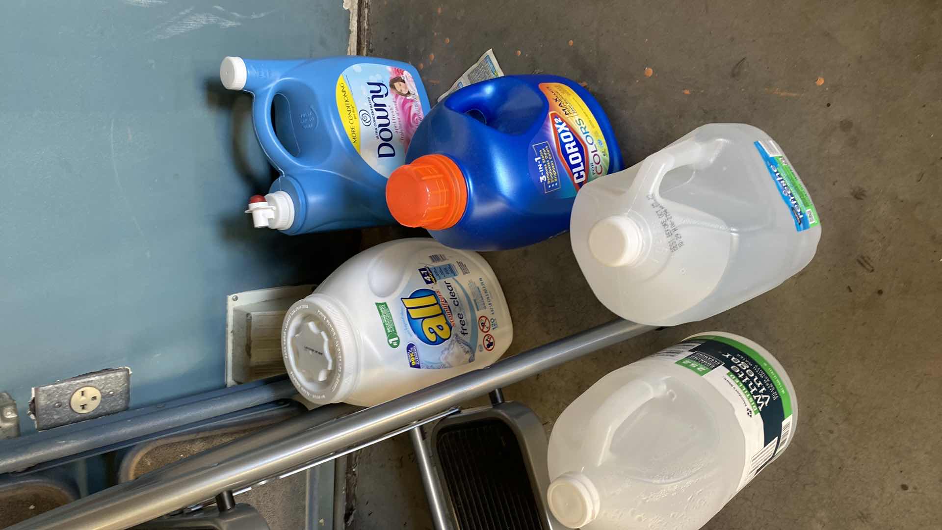 Photo 1 of LAUNDRY SUPPLIES CLEANING DUPPLIES AND 2 STEP STOOLS