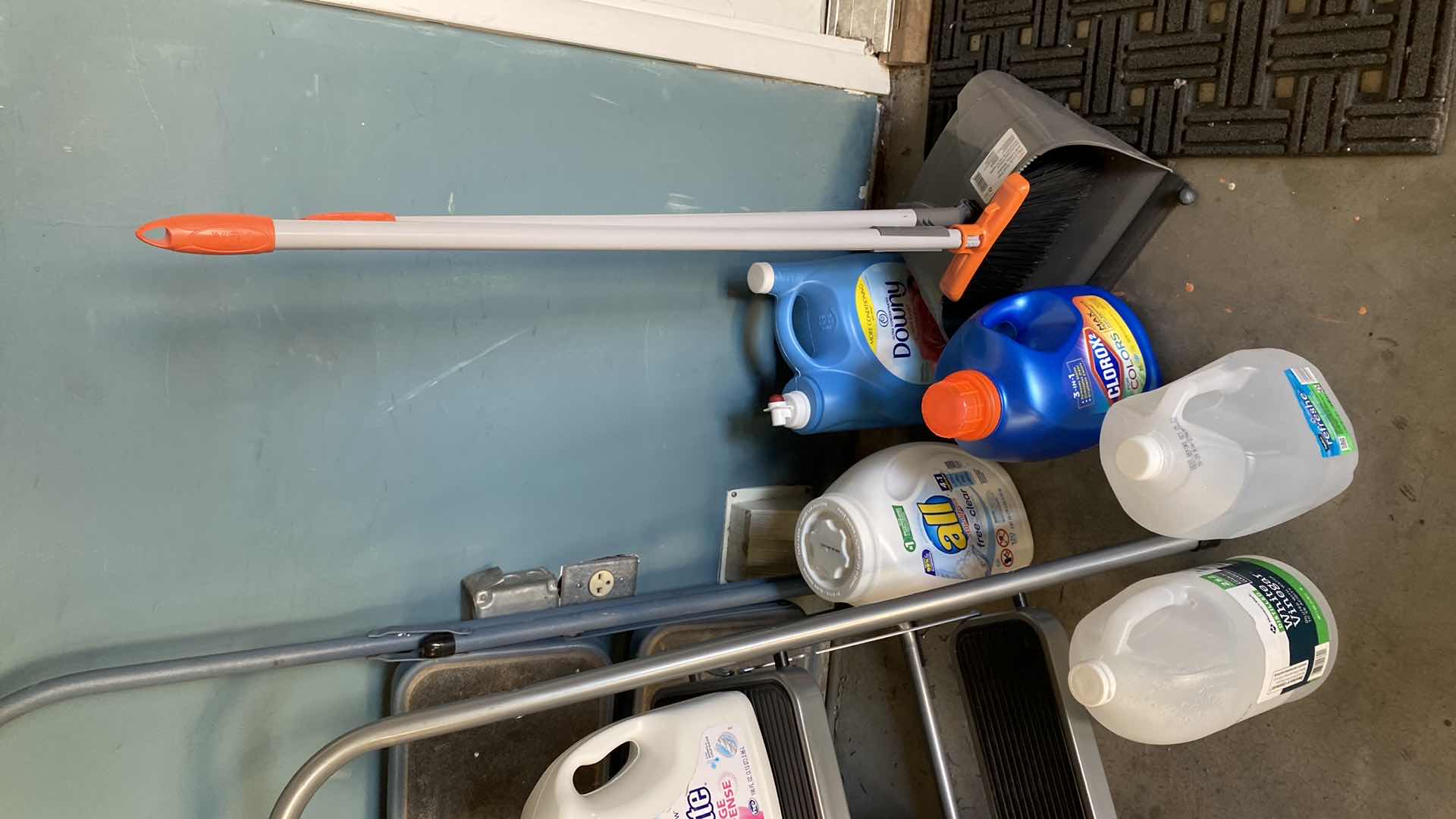 Photo 1 of LAUNDRY SUPPLIES CLEANING DUPPLIES AND 2 STEP STOOLS
