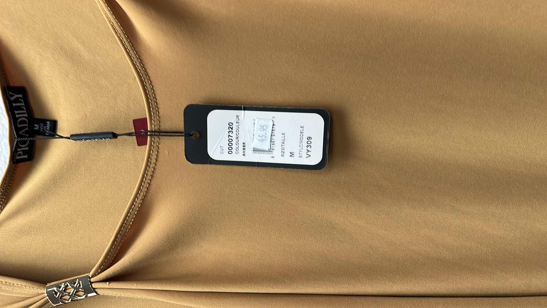 Photo 1 of NWT WOMEN'S SIZE MEDIUM -  Amber blouse $45.95