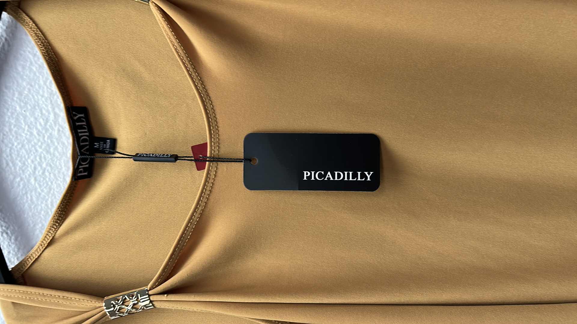 Photo 1 of NWT WOMEN'S SIZE MEDIUM -  Amber blouse $45.95