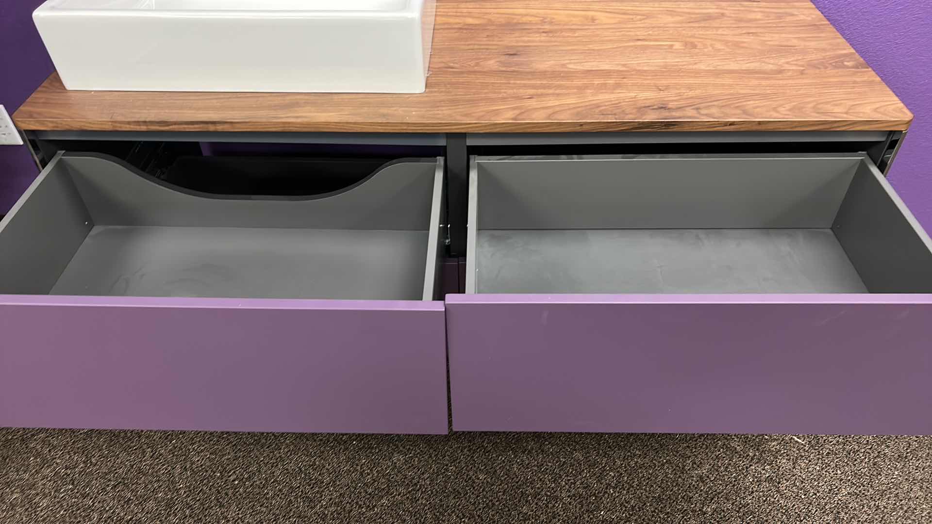 Photo 1 of PURPLE DURAVIT VANITY W 4 DRAWERS AND 18” CERAMIC SINK 