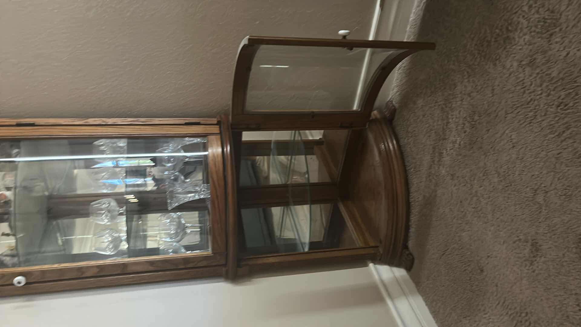 Photo 1 of LIGHTED WOOD CORNER CURIO CABINET (CONTENTS SOLD SEPARATELY) 25” x 17” x H 76”
