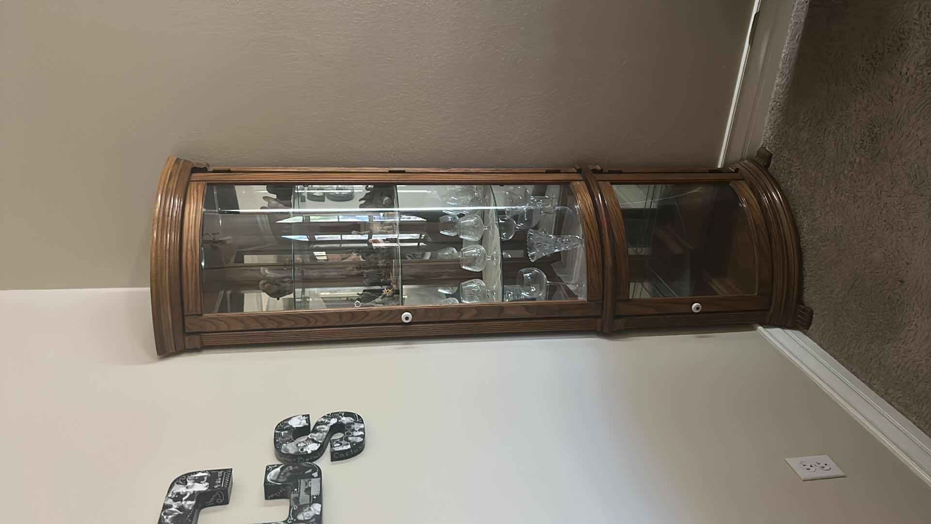 Photo 1 of LIGHTED WOOD CORNER CURIO CABINET (CONTENTS SOLD SEPARATELY) 25” x 17” x H 76”