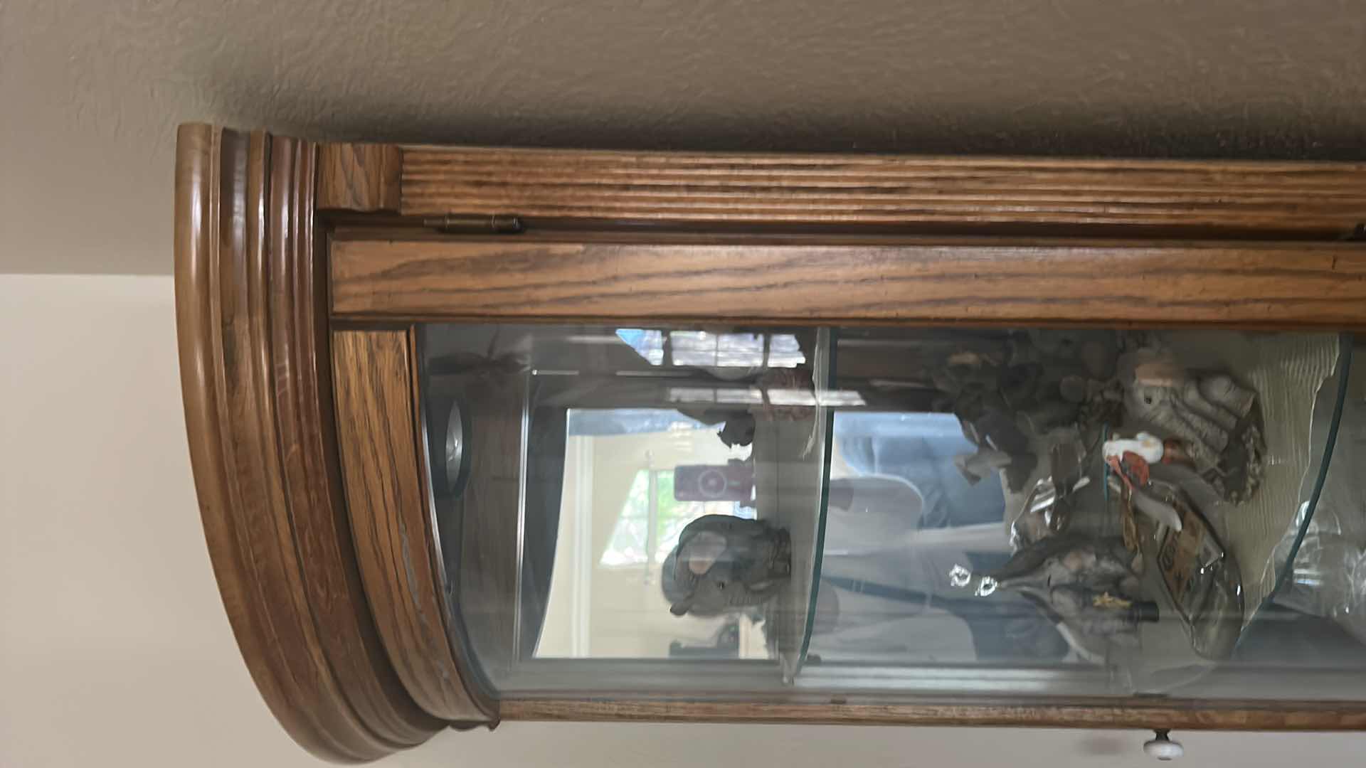 Photo 1 of LIGHTED WOOD CORNER CURIO CABINET (CONTENTS SOLD SEPARATELY) 25” x 17” x H 76”