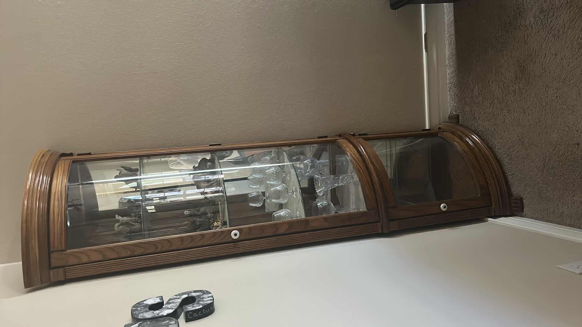 Photo 1 of LIGHTED WOOD CORNER CURIO CABINET (CONTENTS SOLD SEPARATELY) 25” x 17” x H 76”