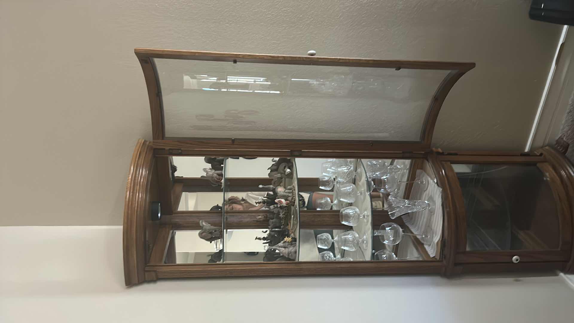 Photo 1 of LIGHTED WOOD CORNER CURIO CABINET (CONTENTS SOLD SEPARATELY) 25” x 17” x H 76”