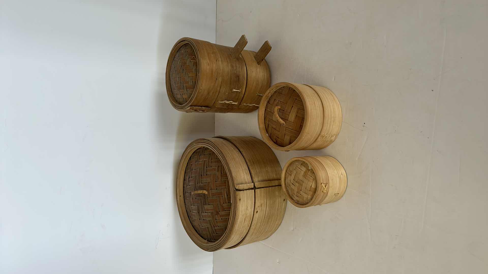 Photo 1 of 4 -  CHINESE WOVEN WICKER VEGTABLE STEAMING BASKETS. LARGEST 7” x 4”