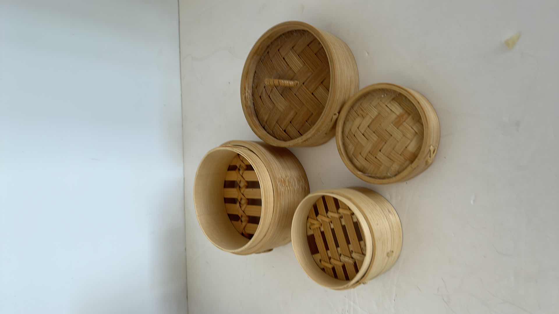 Photo 1 of 4 -  CHINESE WOVEN WICKER VEGTABLE STEAMING BASKETS. LARGEST 7” x 4”