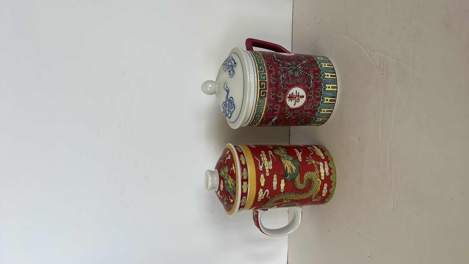 Photo 1 of TWO COLLECTIBLE CHINESE TEACUPS WITH LIDS