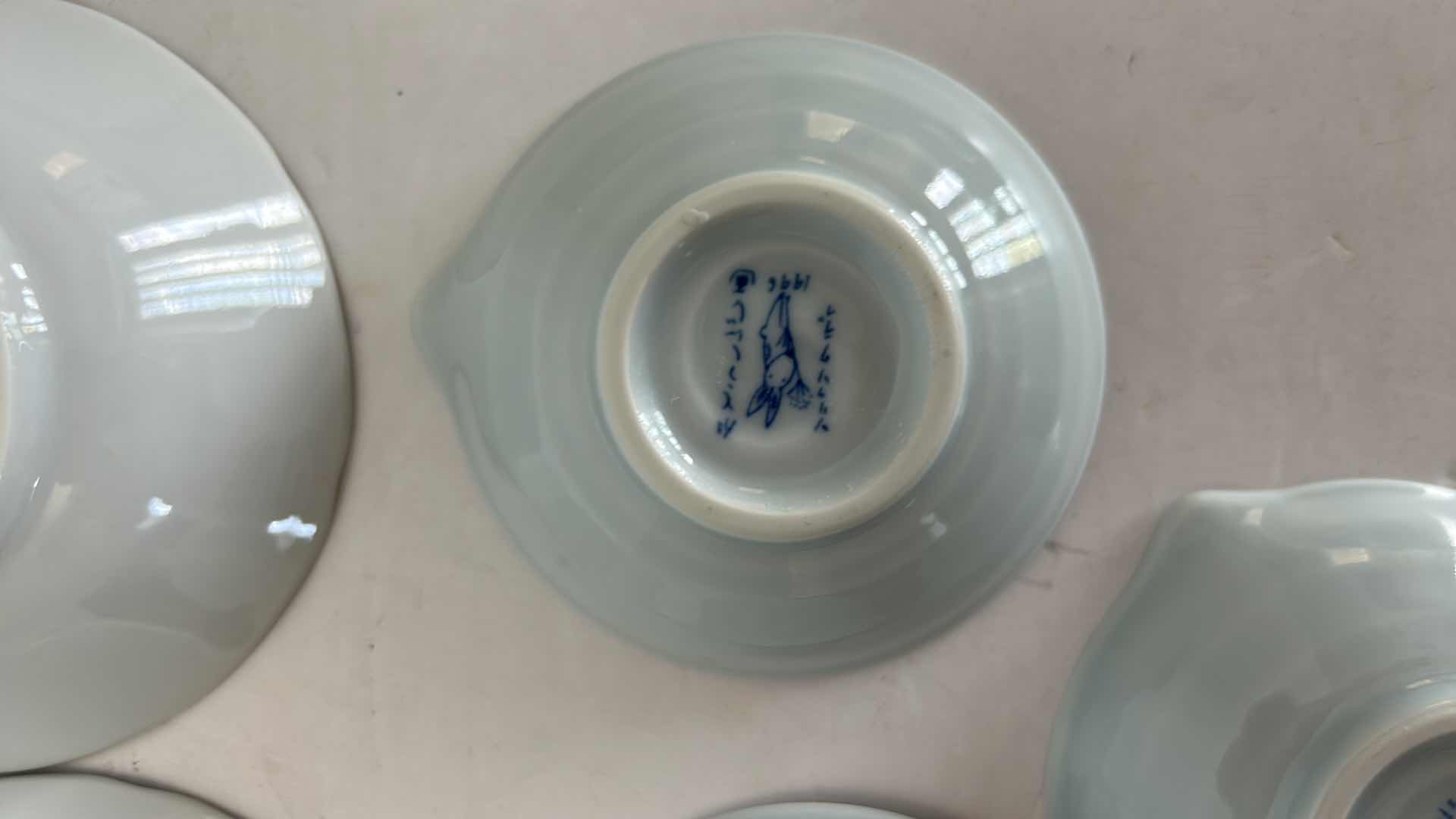 Photo 9 of 7 - BLUE AND WHITE JAPANESE PORCELAIN BOWLS (4 TAKAHASHI) LARGEST  4 1/4”