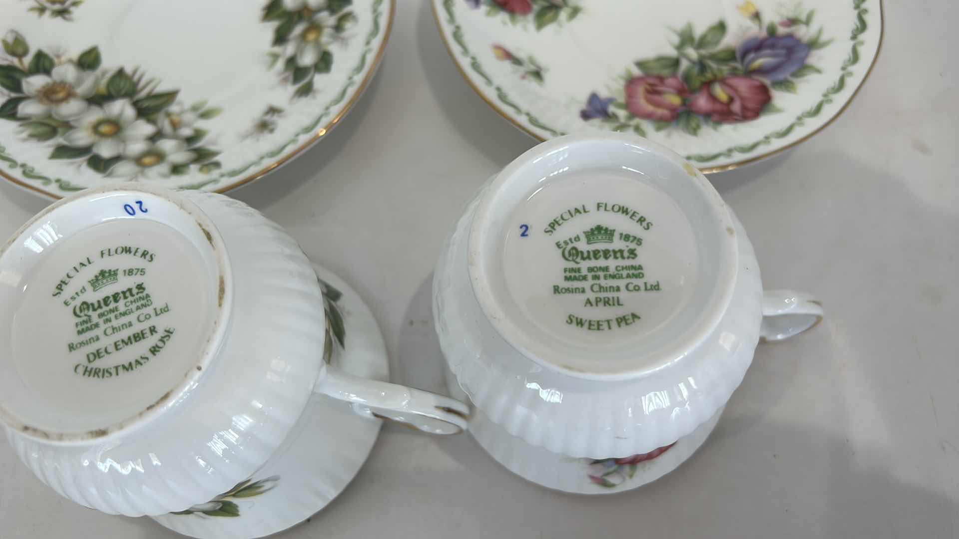 Photo 1 of 2 COLLECTIBE PORCELAIN TEACUPS AND SAUCERS, FINE BONE CHINA  FROM ENGLAND CHRISTMAS ROSE AND SWEET PEA