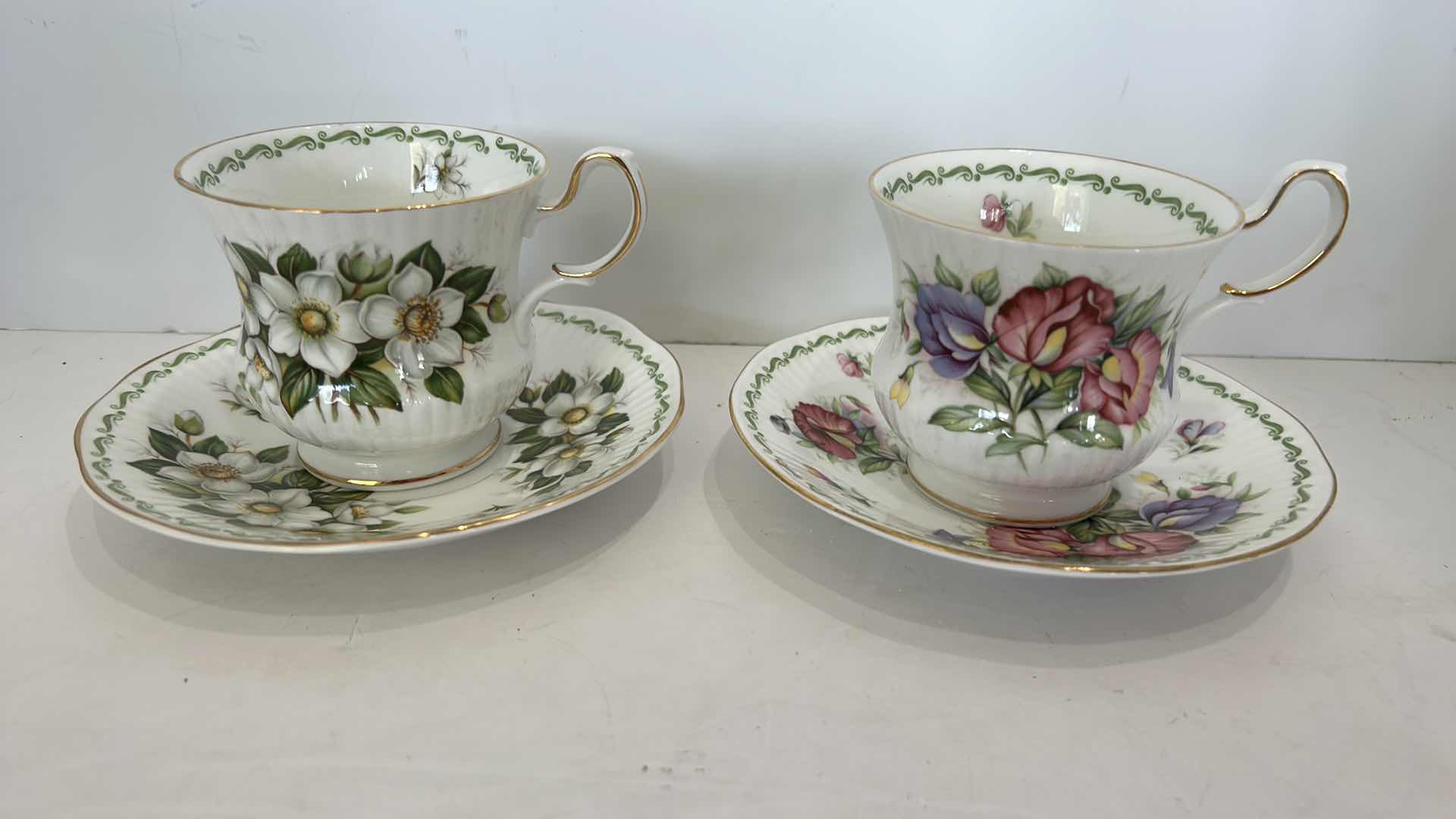 Photo 1 of 2 COLLECTIBE PORCELAIN TEACUPS AND SAUCERS, FINE BONE CHINA  FROM ENGLAND CHRISTMAS ROSE AND SWEET PEA