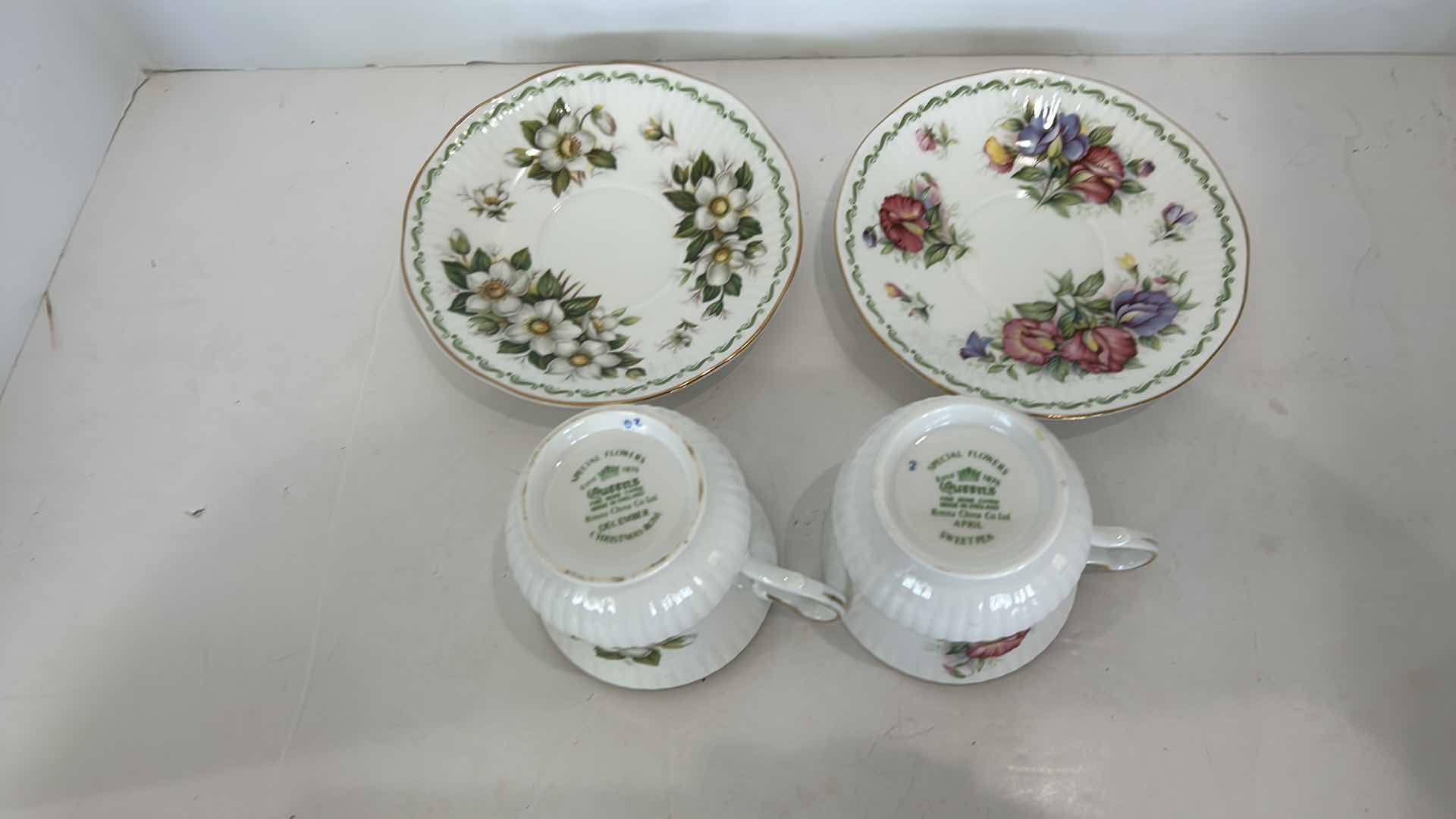 Photo 1 of 2 COLLECTIBE PORCELAIN TEACUPS AND SAUCERS, FINE BONE CHINA  FROM ENGLAND CHRISTMAS ROSE AND SWEET PEA