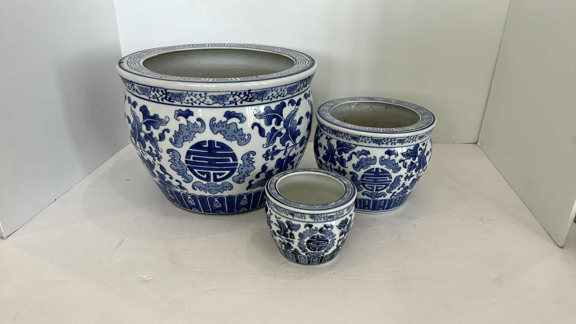 Photo 1 of 3  PIECE -  ASIAN INSPIRED BLUE AND WHITE CERAMIC POTTERY 