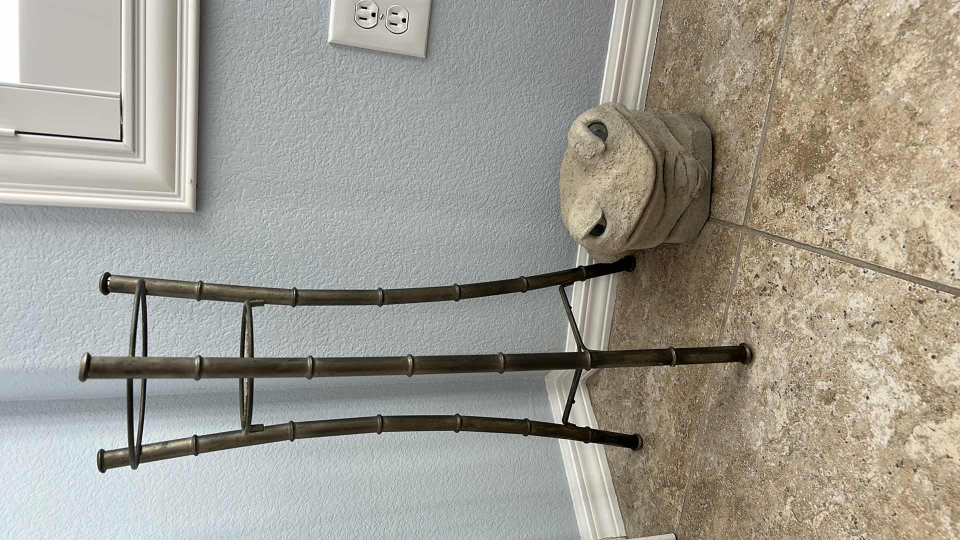 Photo 1 of OUTDOOR DECOR 2  PIECE - METAL BAMBOO PLANT STAND  H 28”AND HEAVY CERAMIC FROG  W SIGNATURE RANKIN