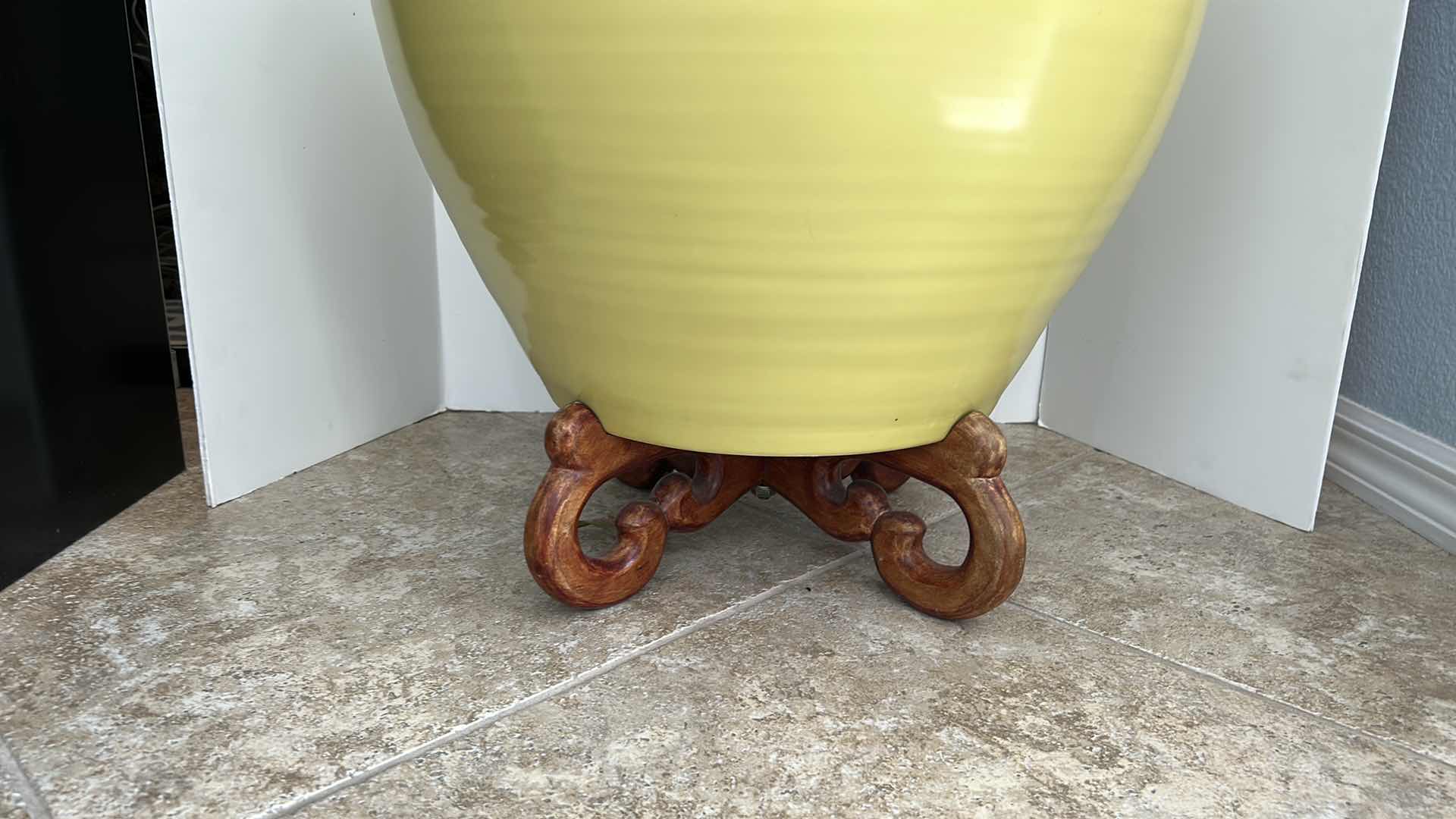 Photo 1 of LARGE YELLOW CERAMIC POTTERY W WOOD STAND AND LIVE MONEY TREE (POT IS 19” x 17”)