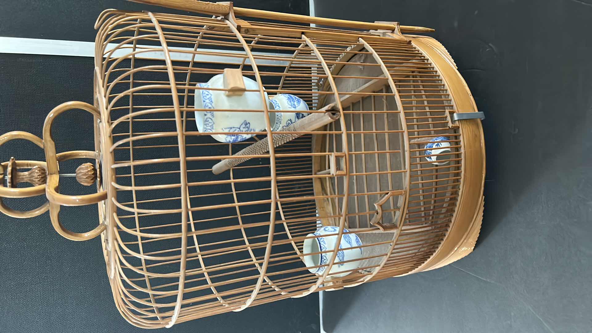 Photo 1 of ANTIQUE CHINESE WOVEN HANDMADE BIRDCAGE WITH PORCELAIN POTTERY FEEDERS 14” x 23”