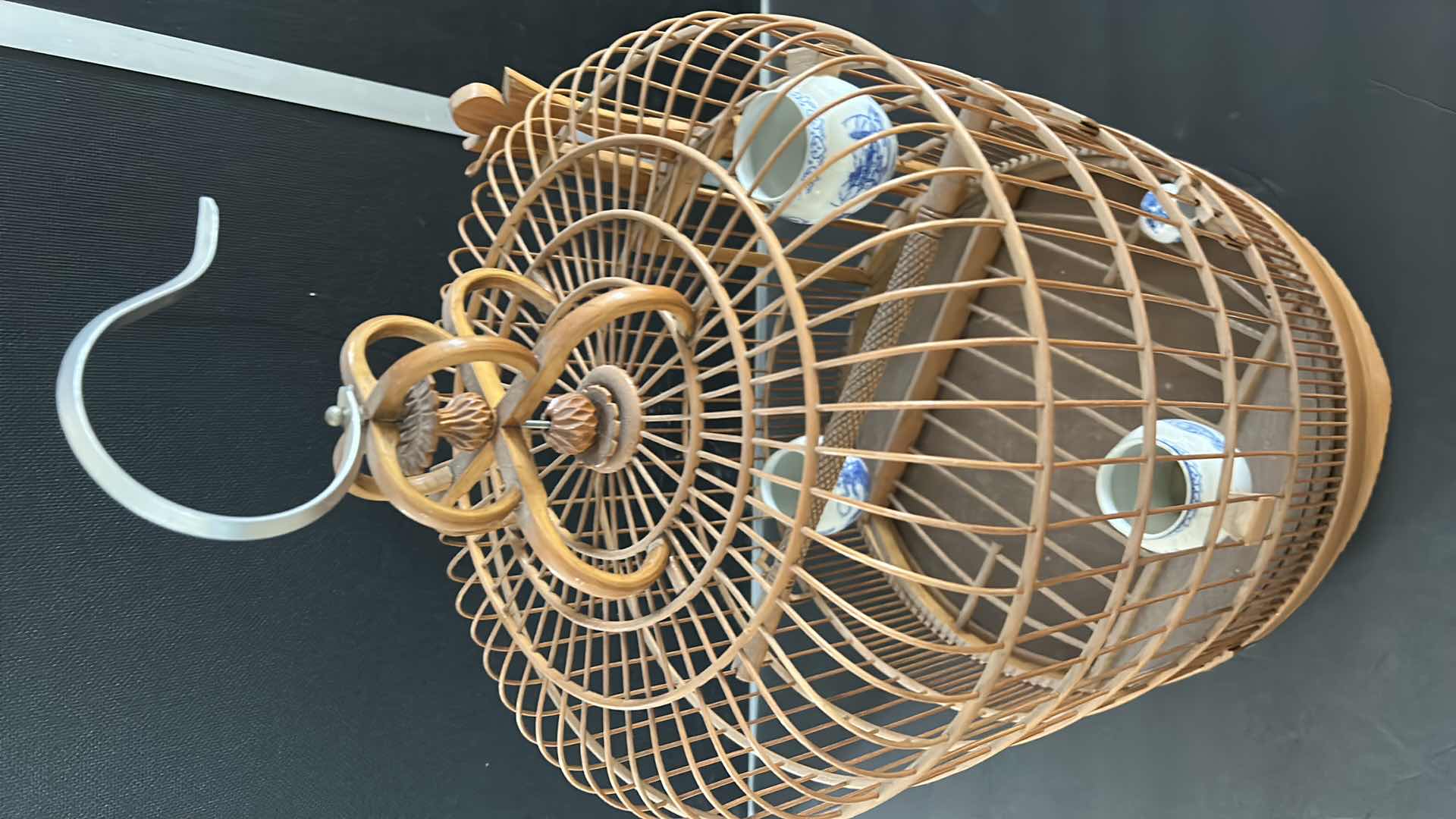 Photo 1 of ANTIQUE CHINESE WOVEN HANDMADE BIRDCAGE WITH PORCELAIN POTTERY FEEDERS 14” x 23”