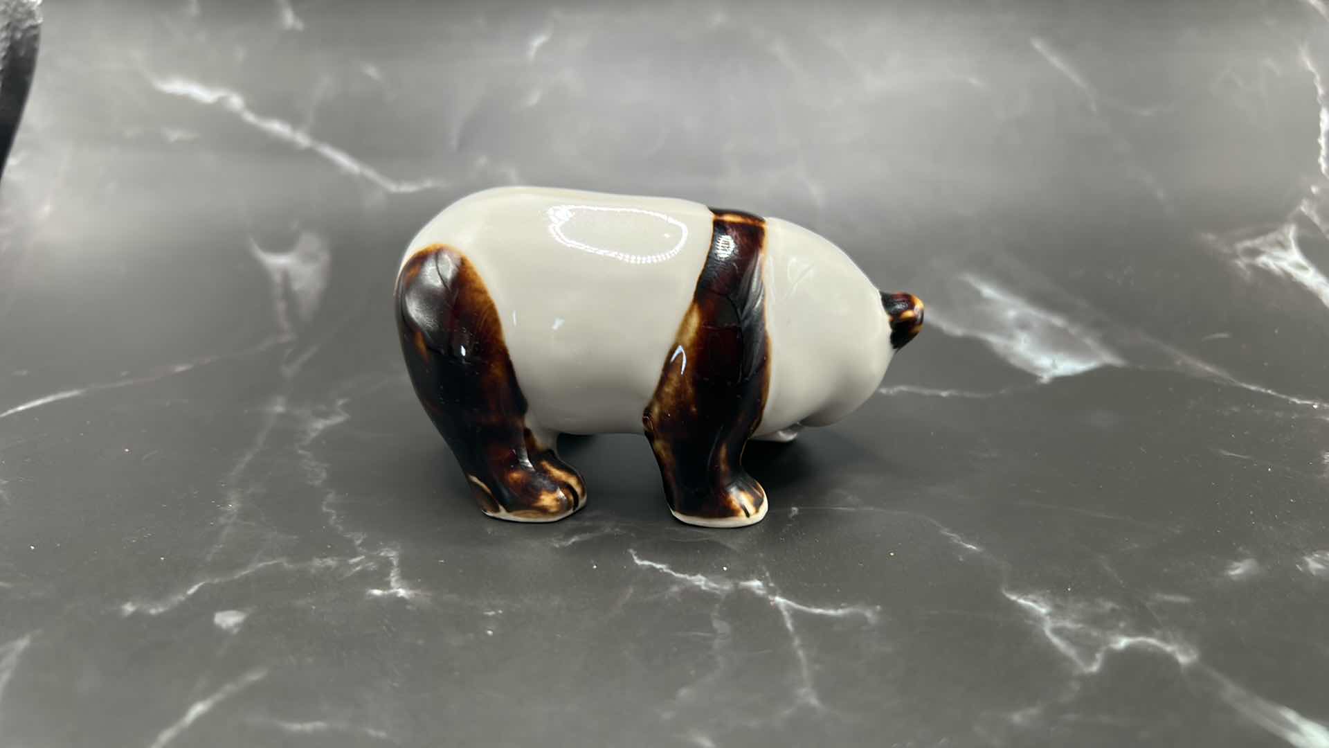 Photo 1 of 2- CHINESE COLLECTIBLES- STAMPED NUMBERED PORCELAIN PANDA BEAR. FRAMED SILK FABRIC W SILK THREADS (panda bear is 3 1/2” x 2”)