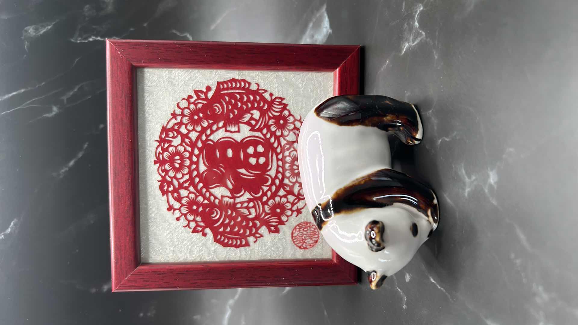 Photo 1 of 2- CHINESE COLLECTIBLES- STAMPED NUMBERED PORCELAIN PANDA BEAR. FRAMED SILK FABRIC W SILK THREADS (panda bear is 3 1/2” x 2”)