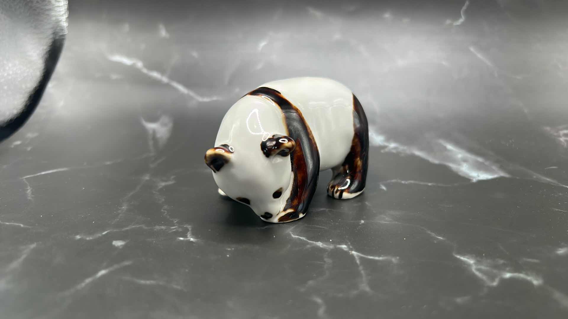 Photo 1 of 2- CHINESE COLLECTIBLES- STAMPED NUMBERED PORCELAIN PANDA BEAR. FRAMED SILK FABRIC W SILK THREADS (panda bear is 3 1/2” x 2”)