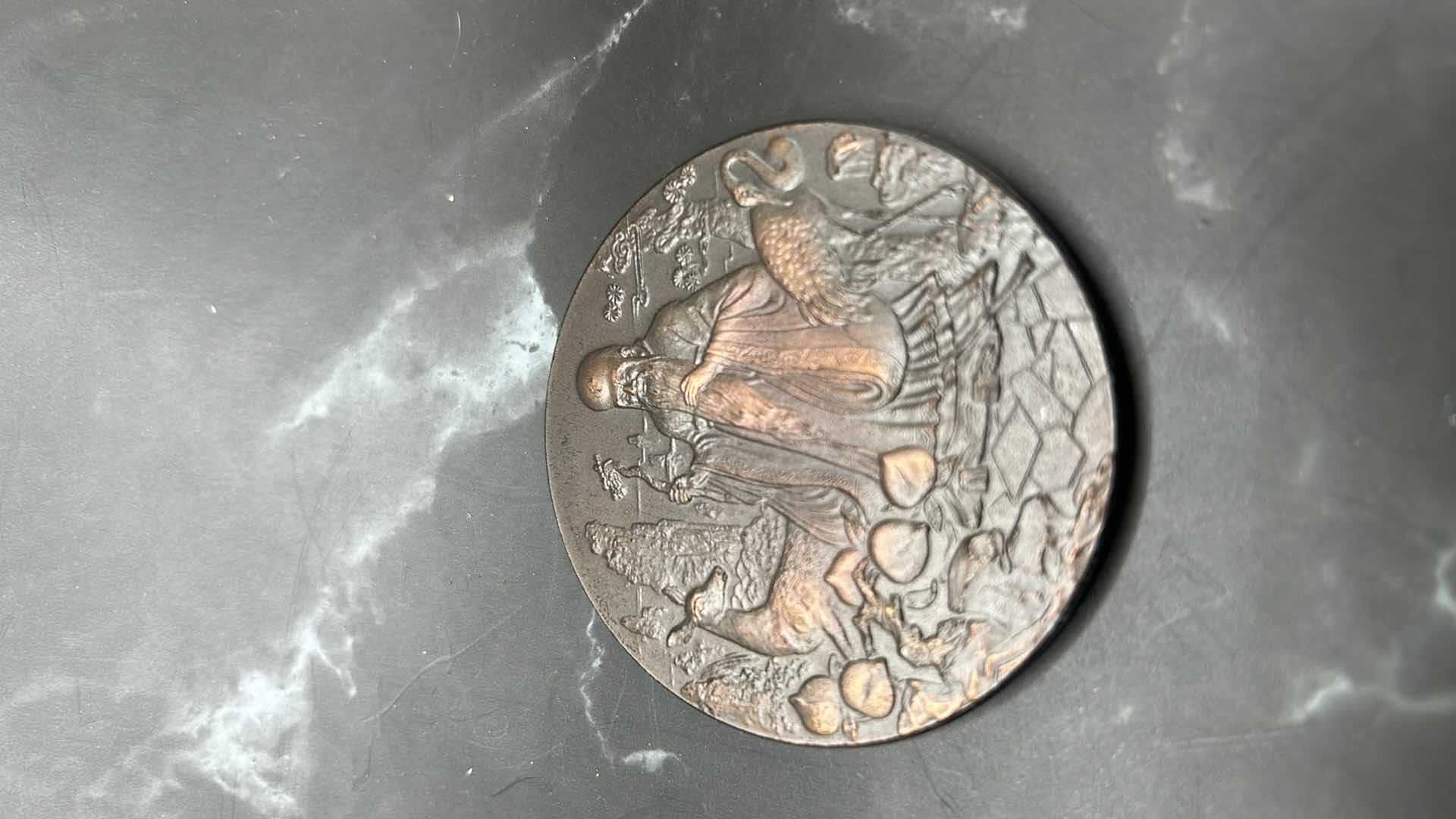 Photo 1 of 4 - PIECE CHINESE COLLECTIBLES - TWO WOVEN BASKETS AND TWO METAL COINS (LARGEST BASKET MEASURES 5” x 5”