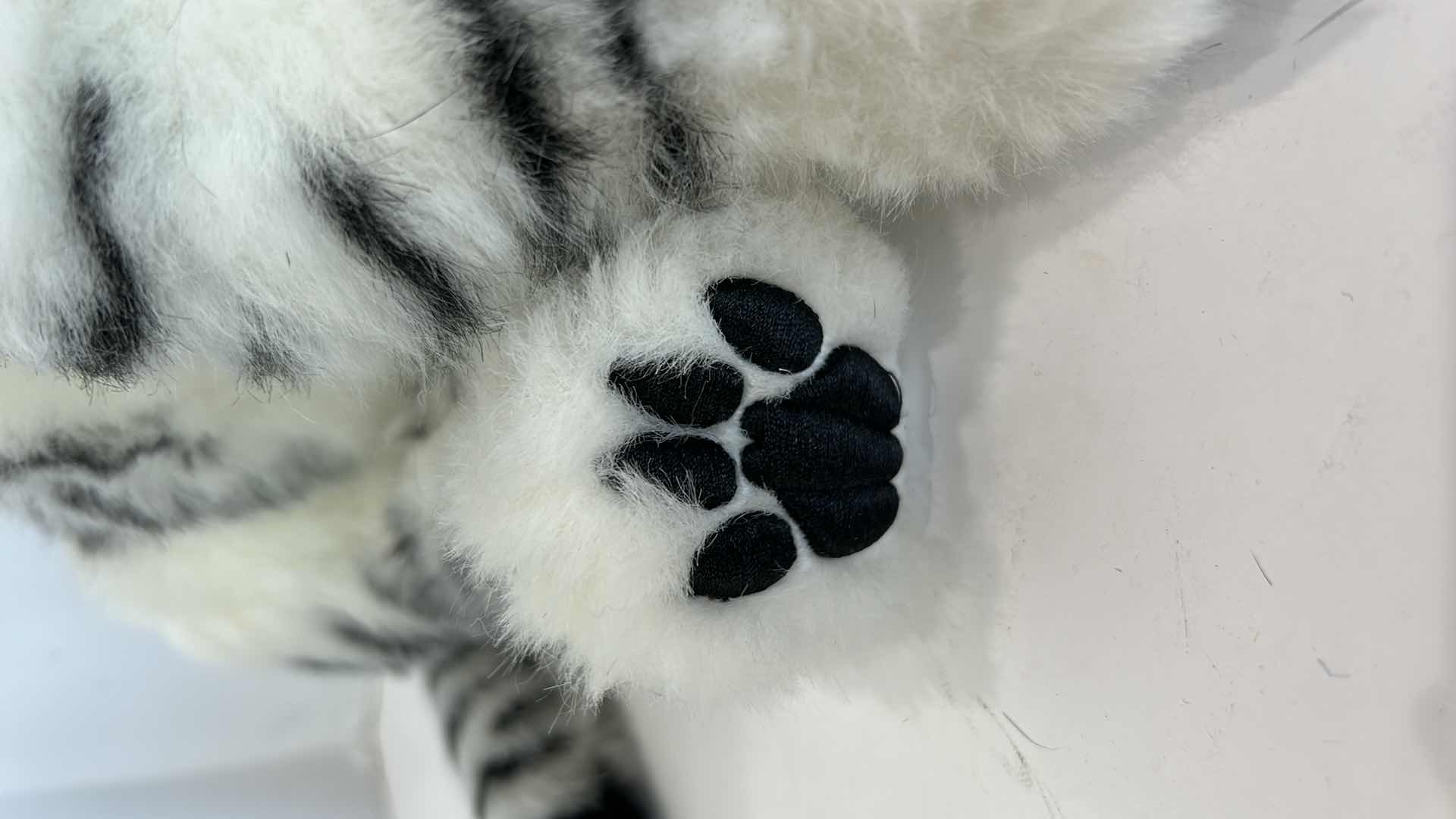 Photo 1 of BATTERY OPERATED SNOW LEOPARD STUFFED ANIMAL H16"