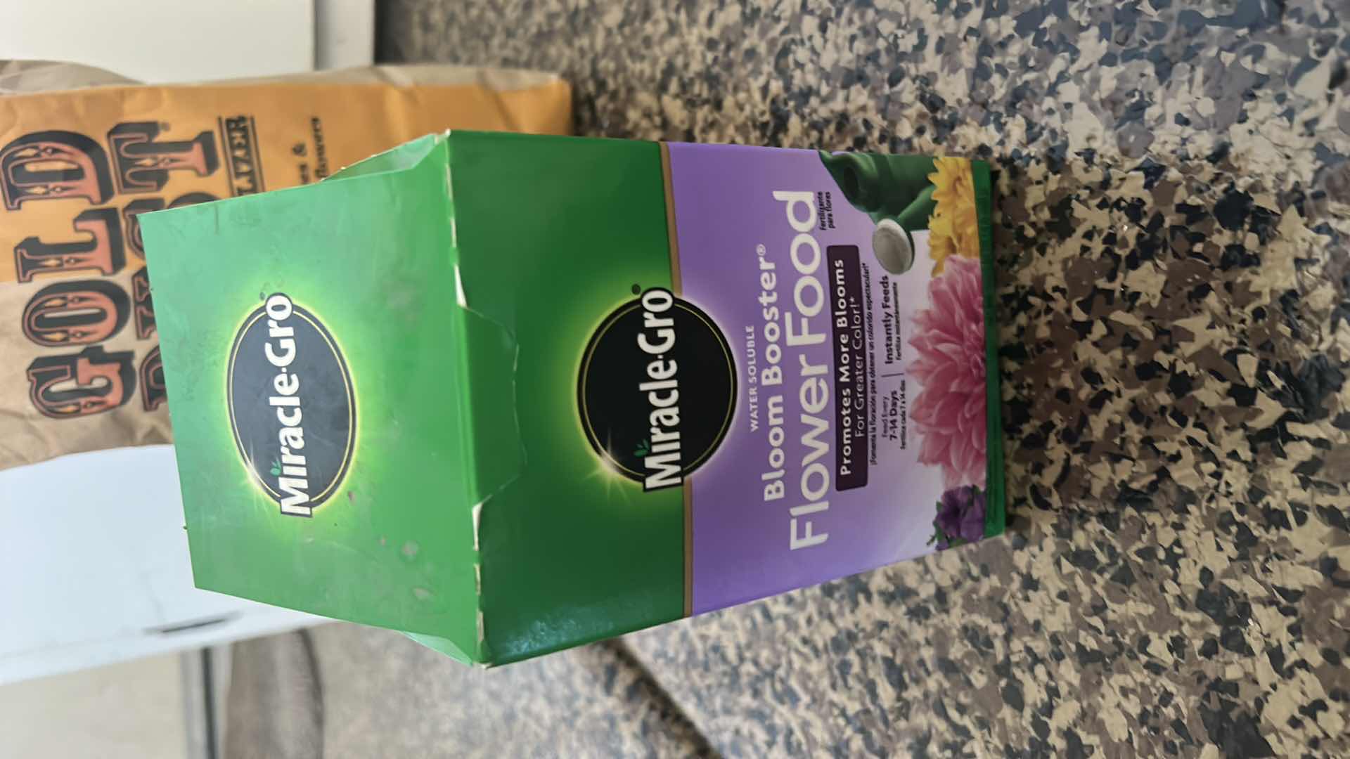 Photo 2 of GARDEN TOOLS AND FERTILIZER 