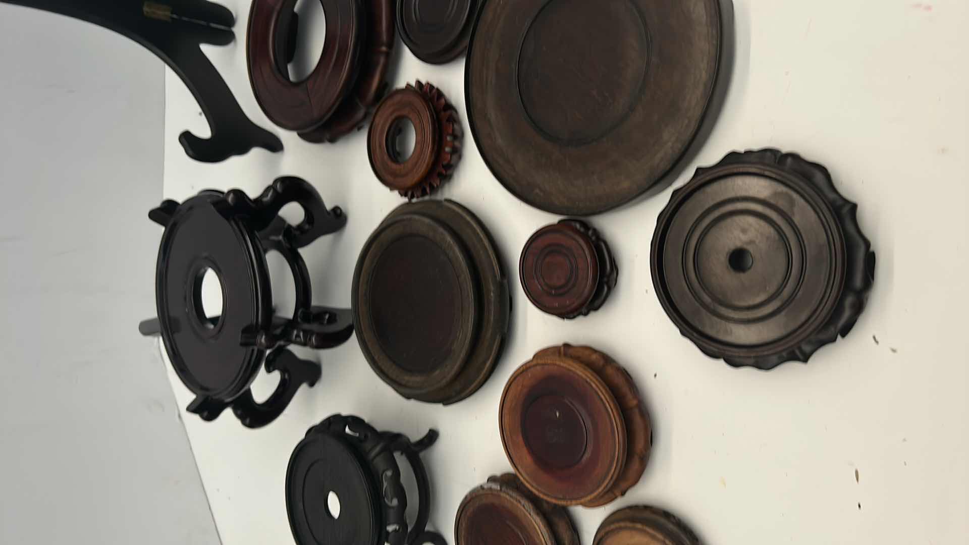 Photo 1 of BOX OF CHINESE WOOD VASE / POT STANDS, LARGEST FITS  7.25” BASE