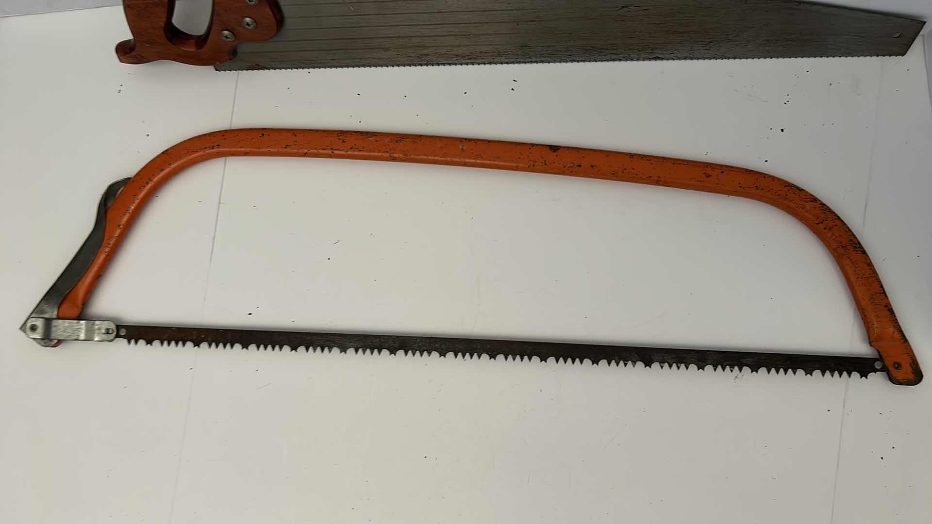 Photo 2 of TOOLS - 2 SAWS, LONGEST 29"