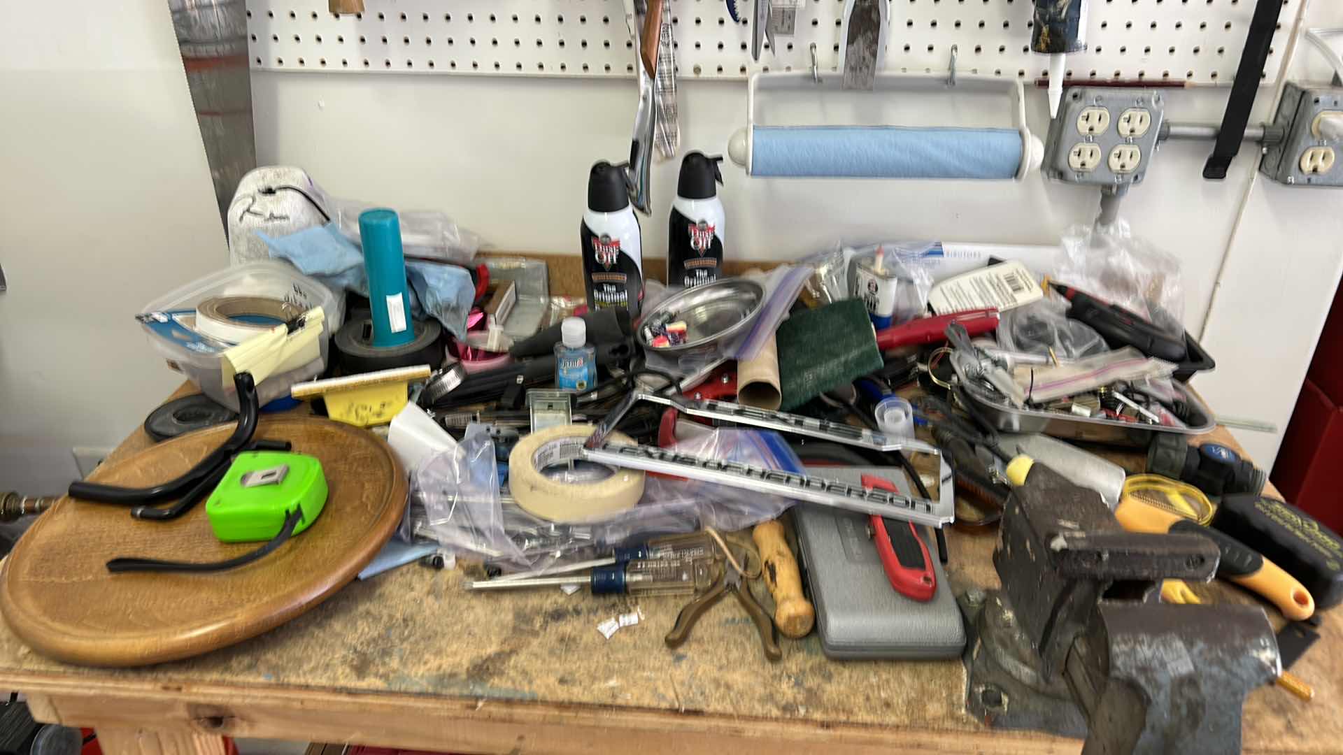 Photo 1 of CONTENTS SIDE WALL IN GARAGE, INCLUDES WORK BENCH, AND ALL TOOLS ON BENCH, PEG BOARD AND HANGING LIGHT FIXTURE 43” x 25.5” x H38”
