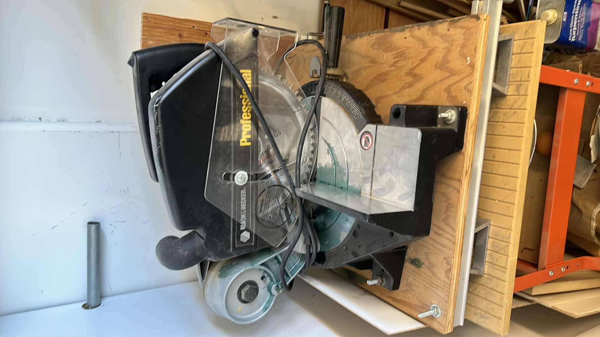 Photo 1 of BLACK AND DECKER PROFESSIONAL SAW PLUS WORK TABLE TURPENTINE AND WOOD PIECES