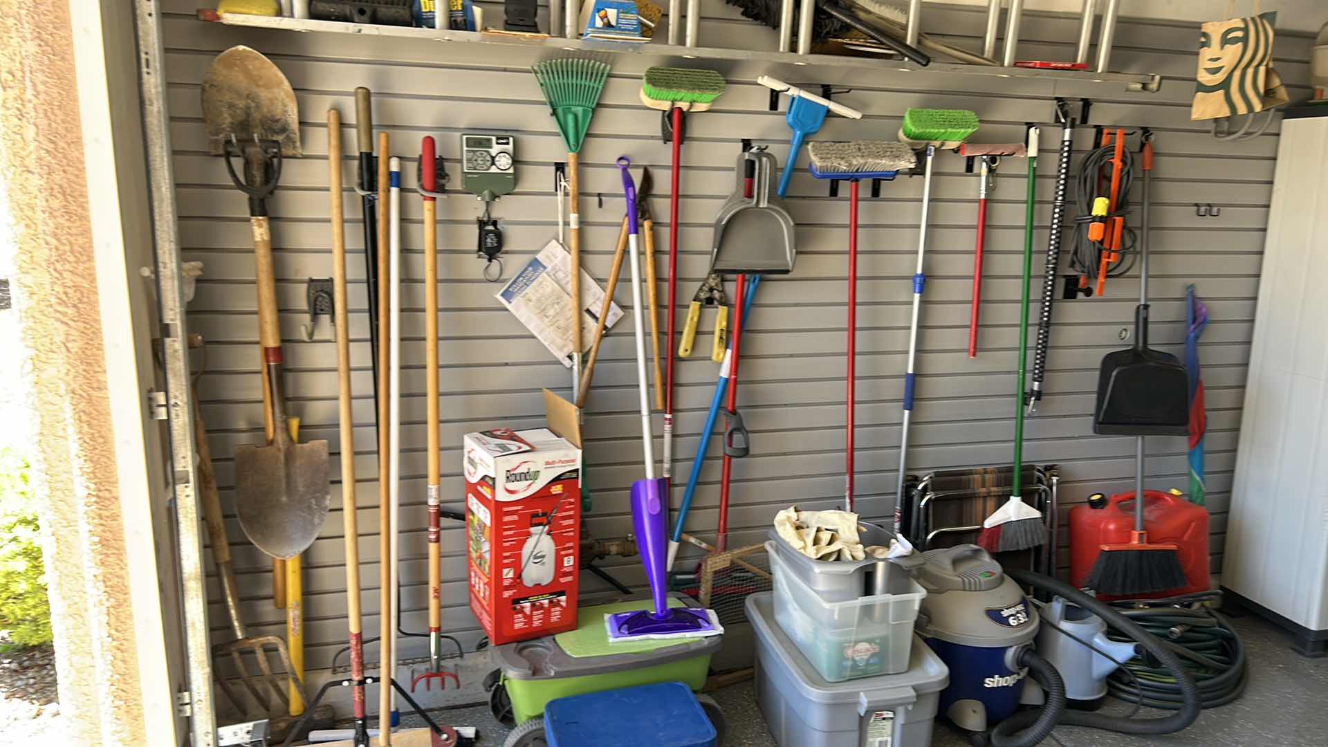 Photo 1 of CONTENTS OF SIDE WALL IN GARAGE INCLUDES LADDER (buyer to remove)