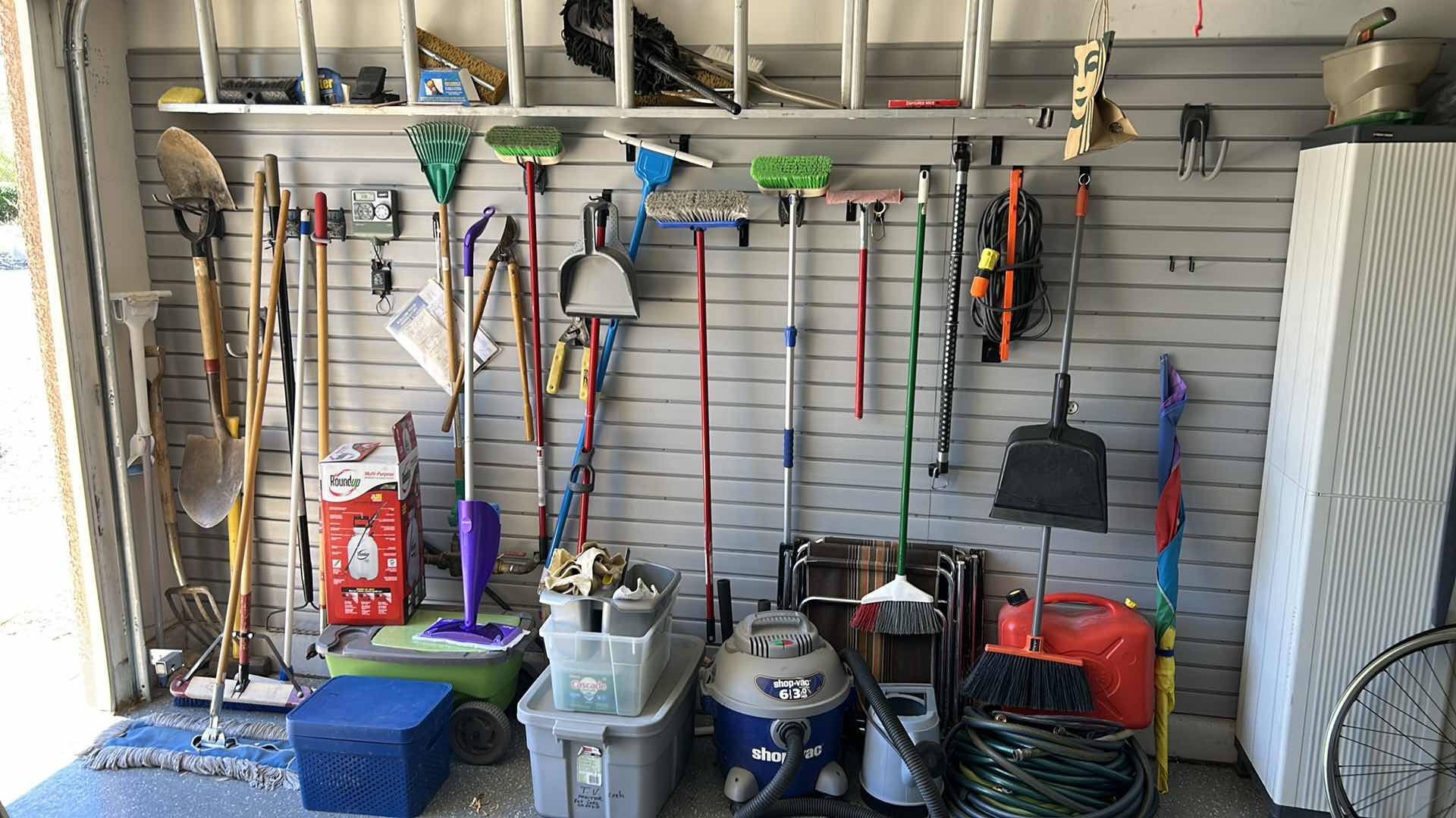 Photo 1 of CONTENTS OF SIDE WALL IN GARAGE INCLUDES LADDER (buyer to remove)