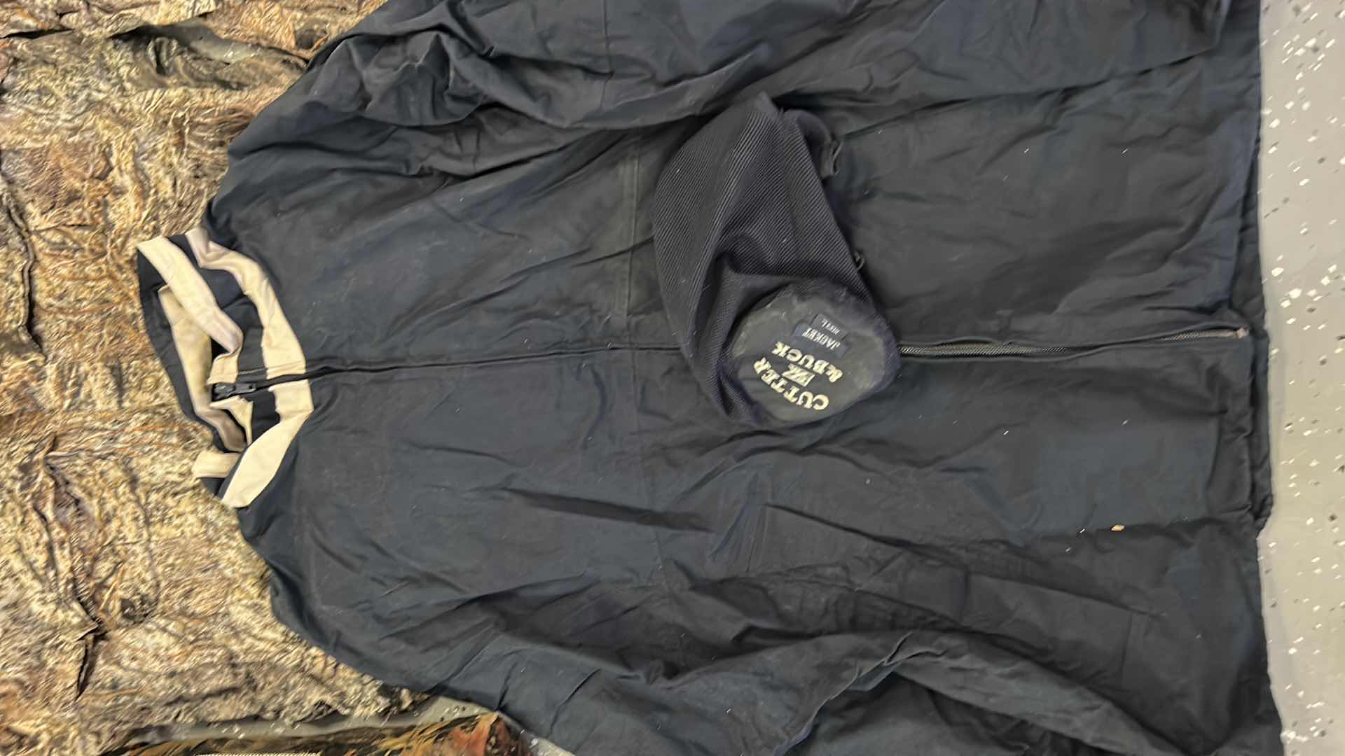 Photo 1 of MENS CAMO TOTE WITH CAMPING AND HUNTING GEAR