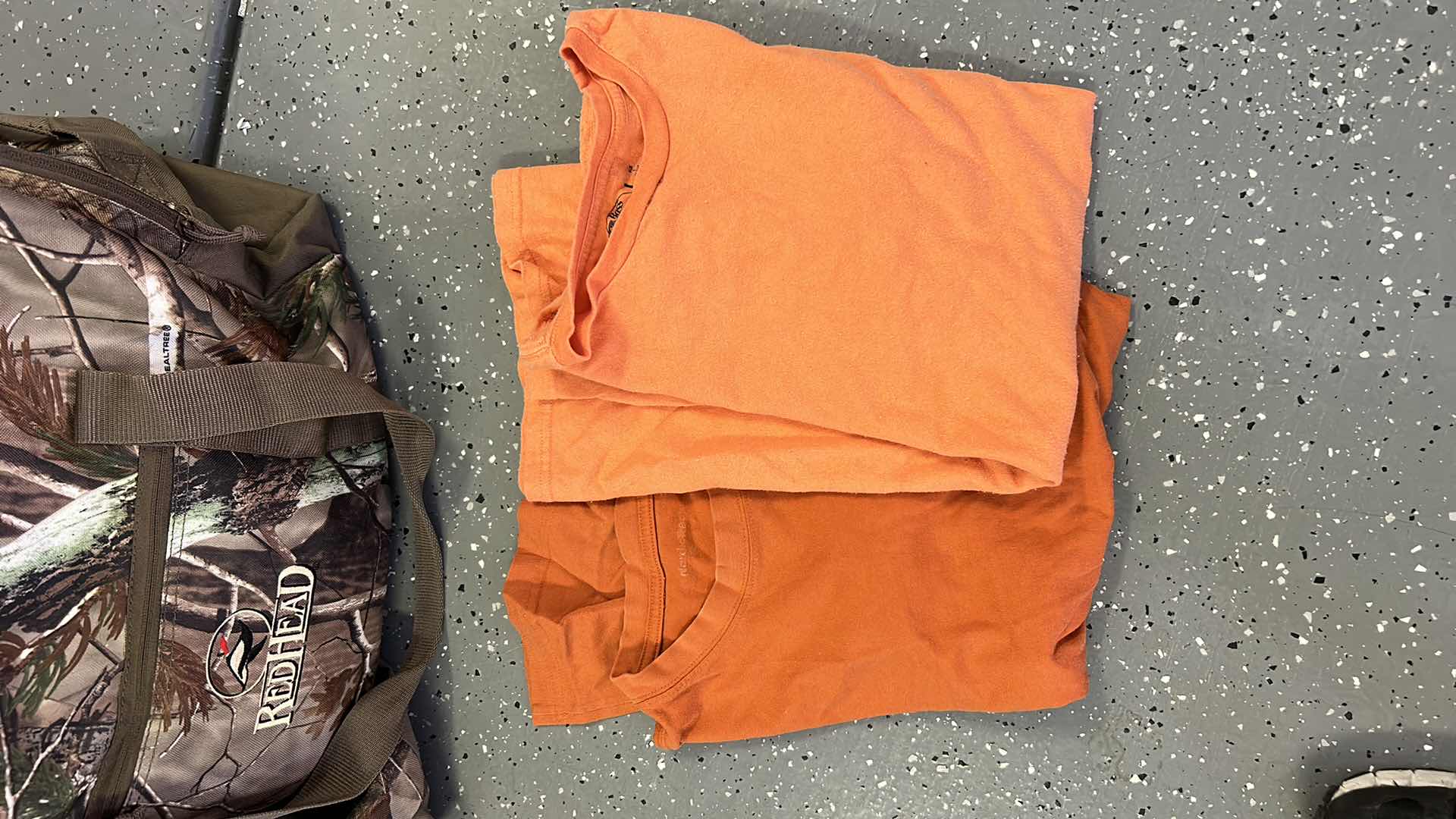 Photo 1 of MENS CAMO TOTE WITH CAMPING AND HUNTING GEAR