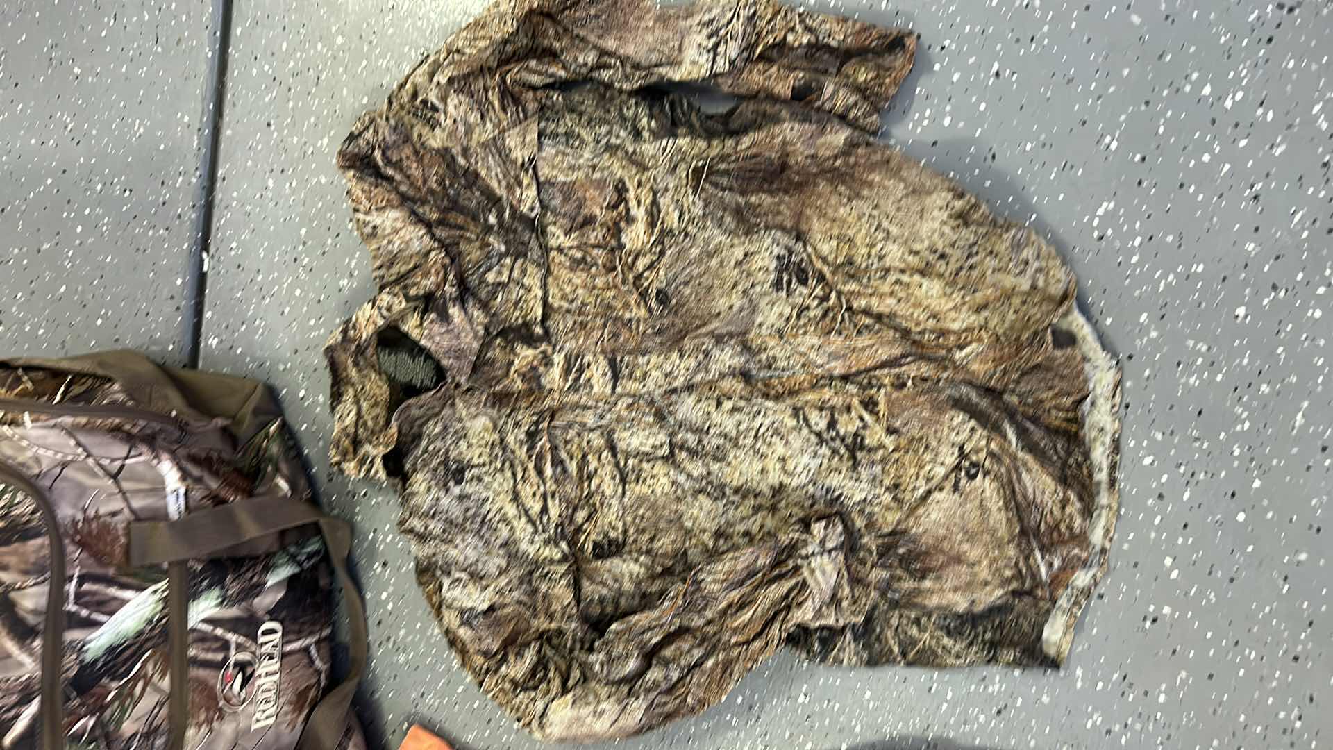 Photo 1 of MENS CAMO TOTE WITH CAMPING AND HUNTING GEAR