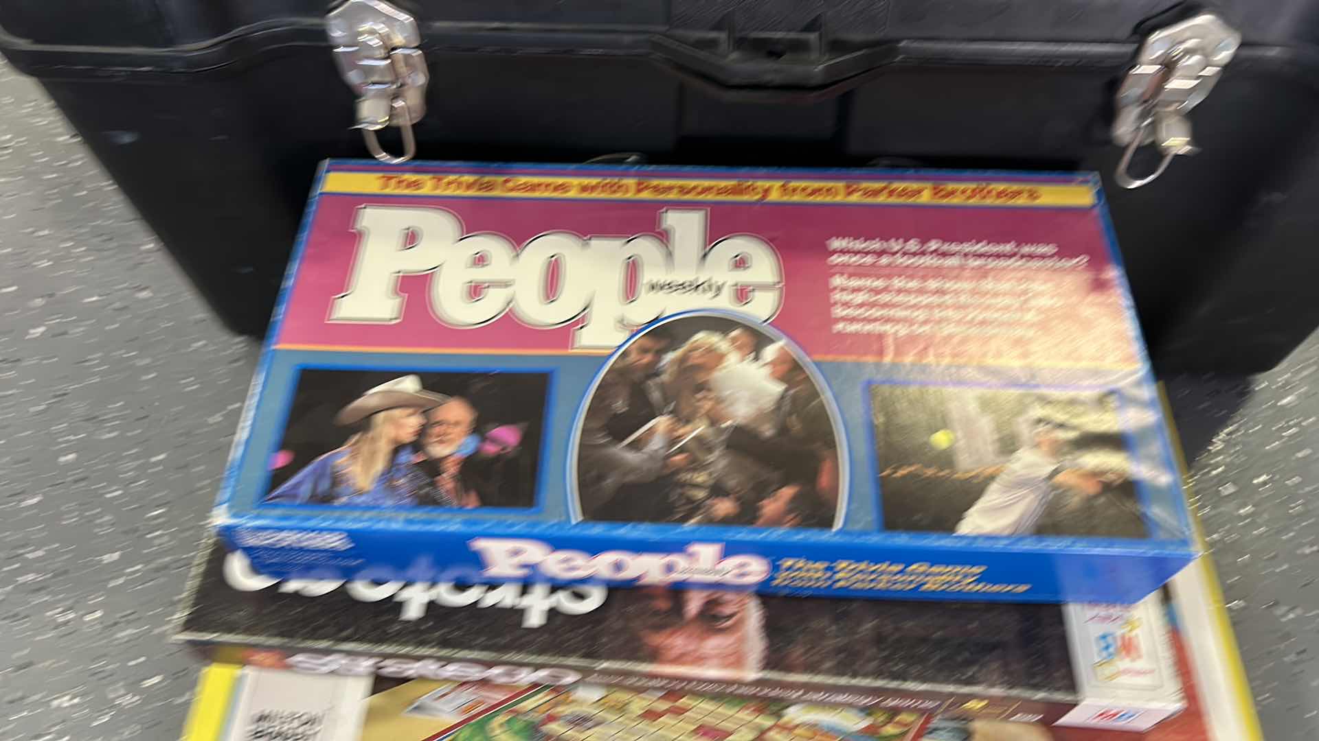 Photo 1 of LARGE BLACK TOTE WITH GAMES AND RC TRUCK