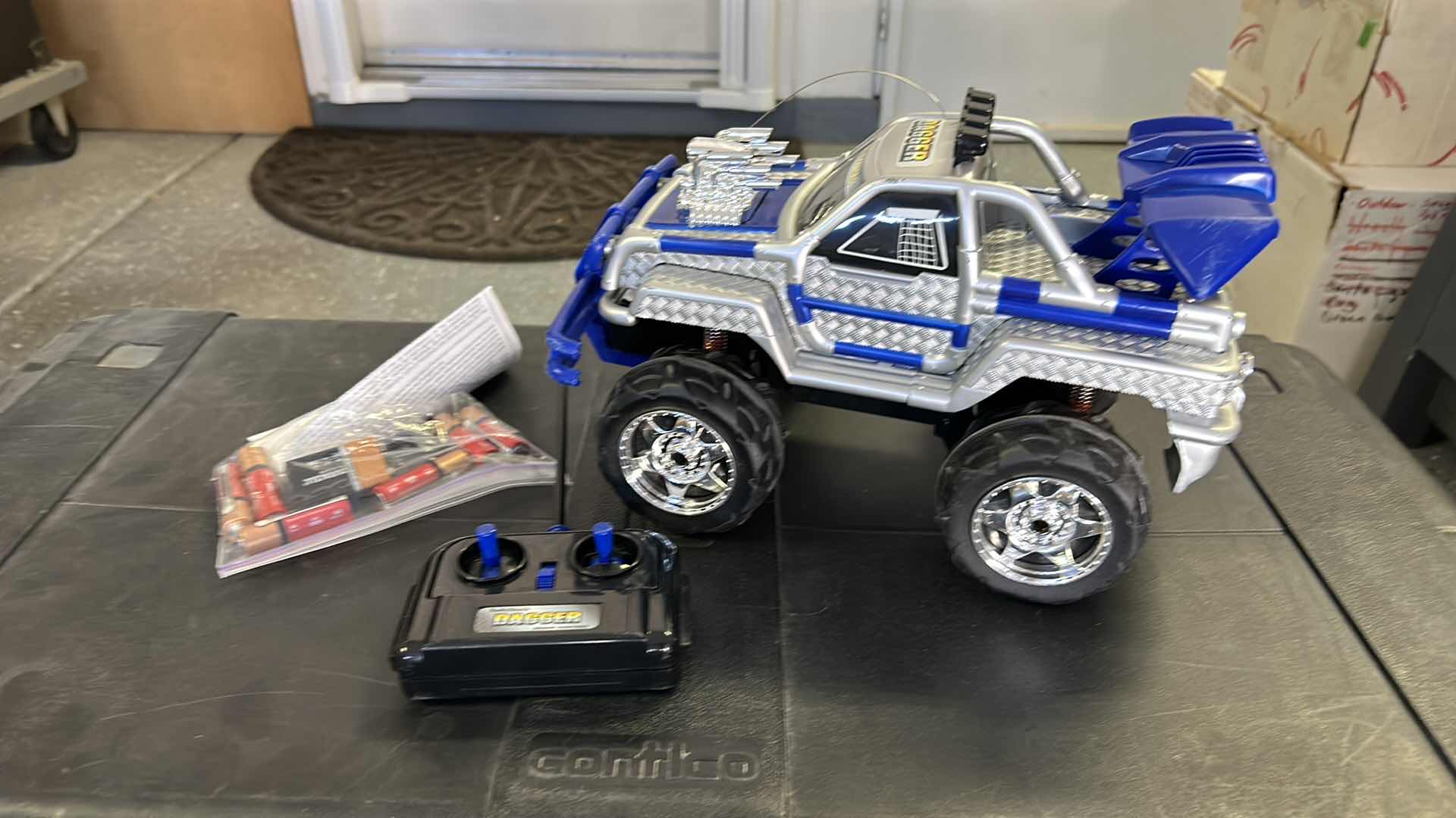 Photo 1 of LARGE BLACK TOTE WITH GAMES AND RC TRUCK