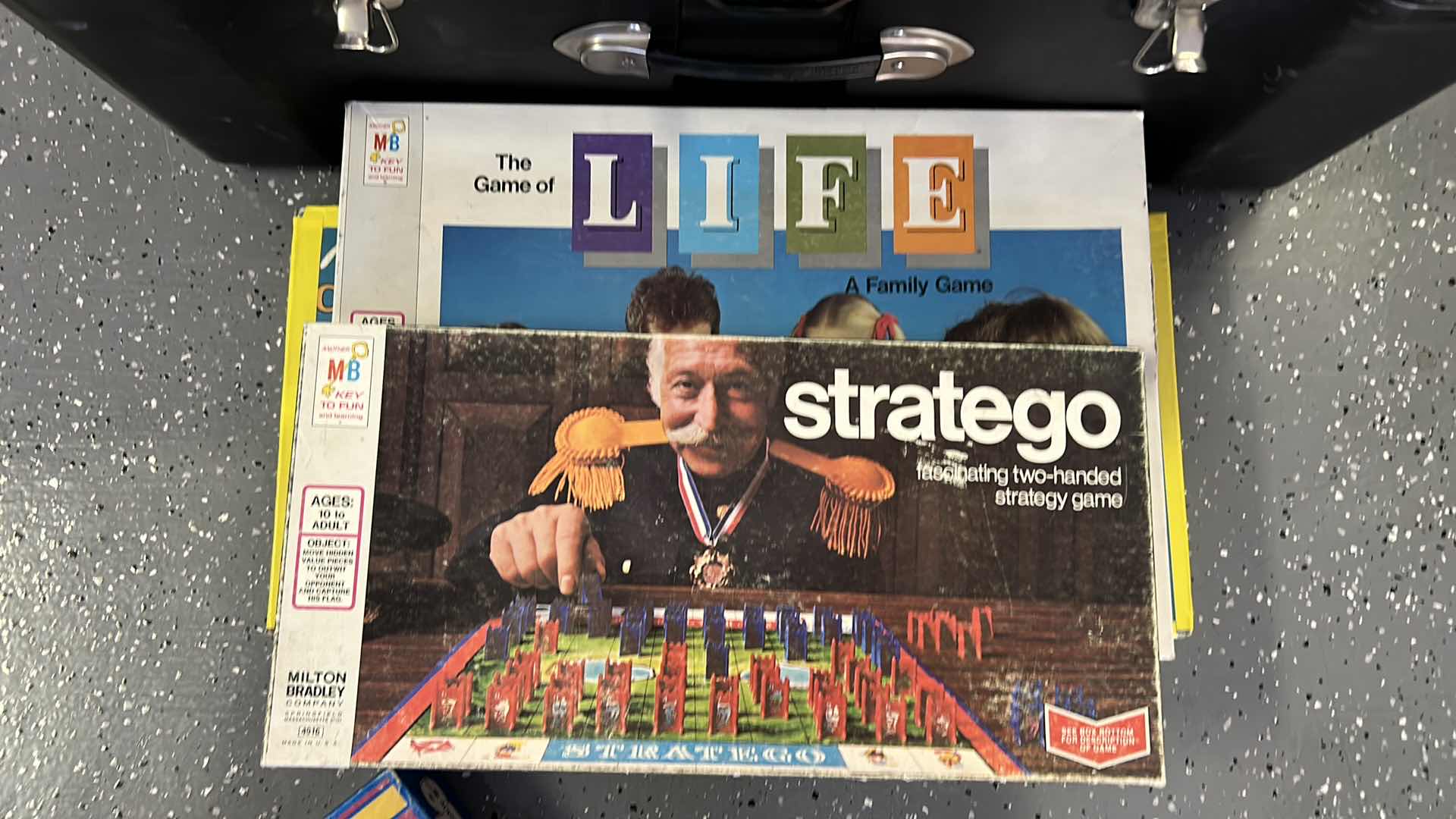 Photo 1 of LARGE BLACK TOTE WITH GAMES AND RC TRUCK