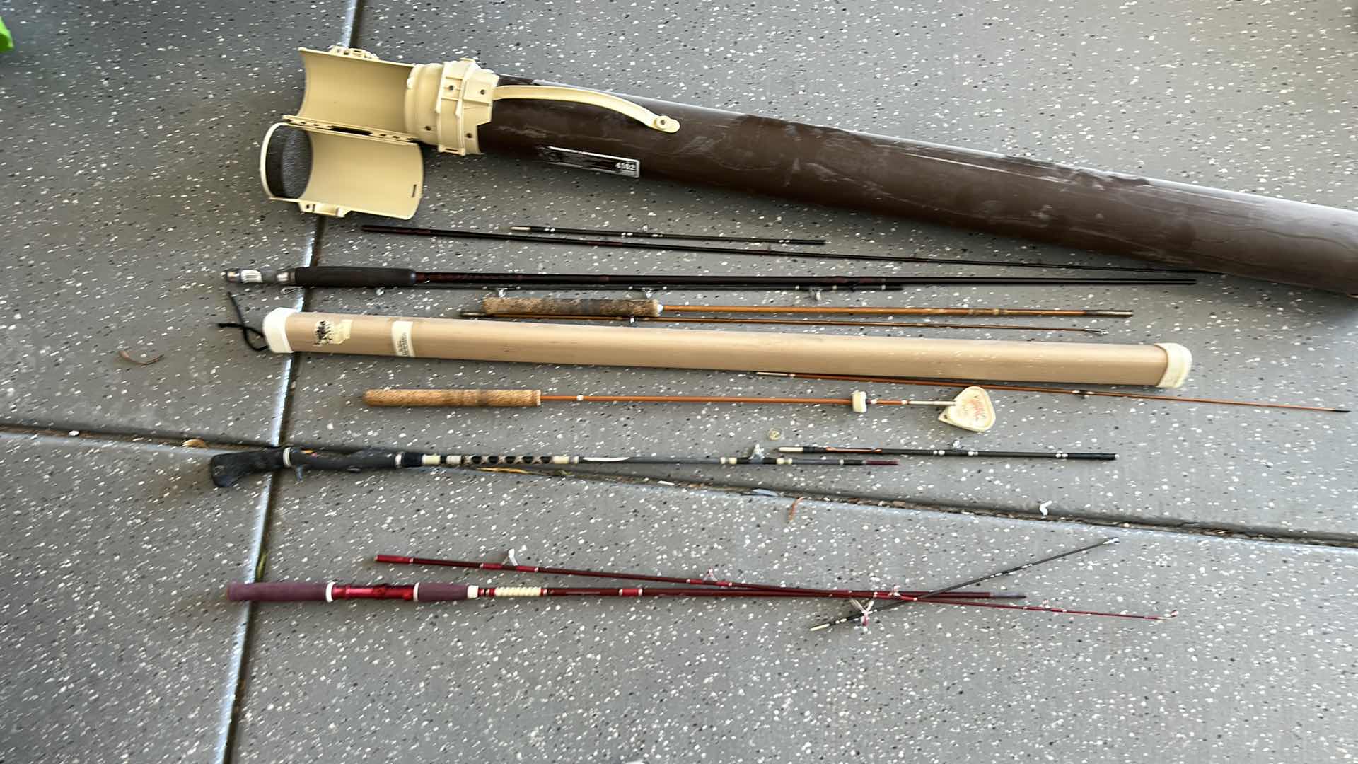 Photo 1 of Fishing poles in case