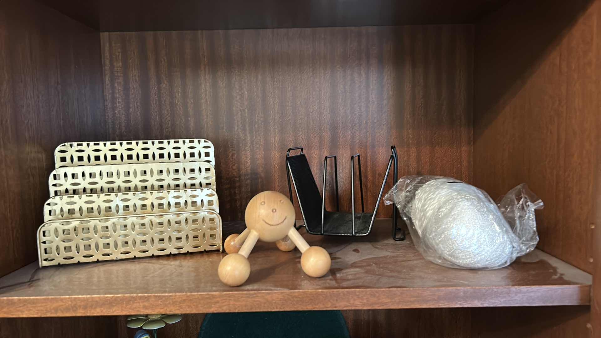 Photo 2 of CONTENTS OF BOOKSHELVES - HOME DECOR - METAL SCULPTURES , GOLF FIGURINES AND MORE