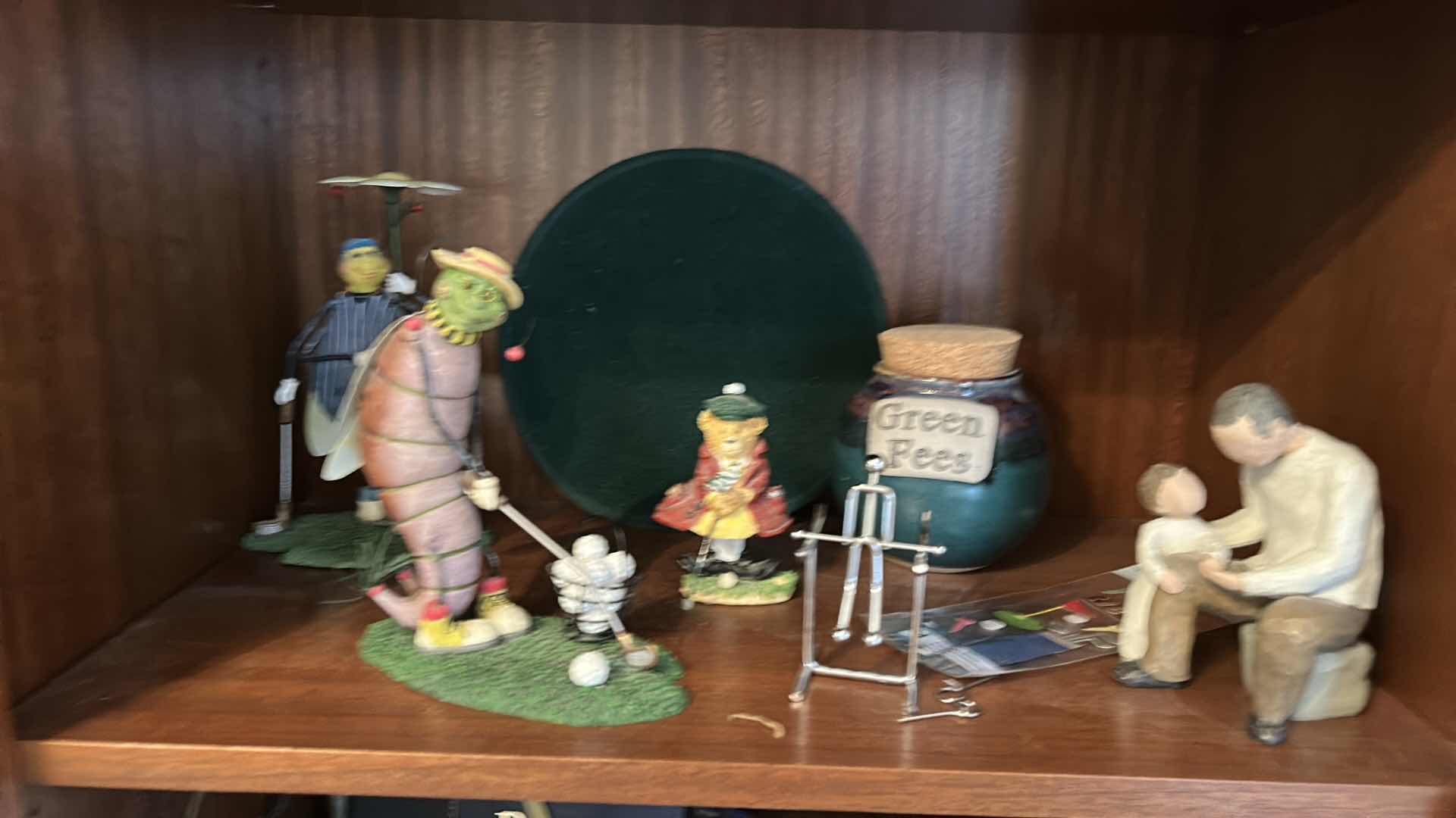 Photo 3 of CONTENTS OF BOOKSHELVES - HOME DECOR - METAL SCULPTURES , GOLF FIGURINES AND MORE