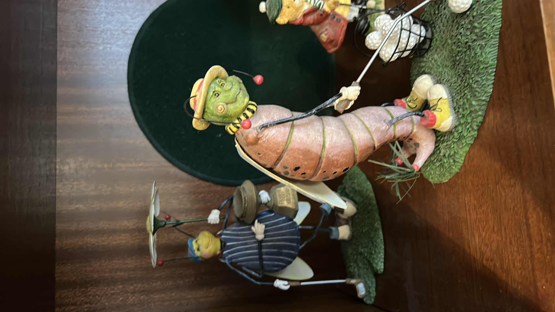 Photo 4 of CONTENTS OF BOOKSHELVES - HOME DECOR - METAL SCULPTURES , GOLF FIGURINES AND MORE