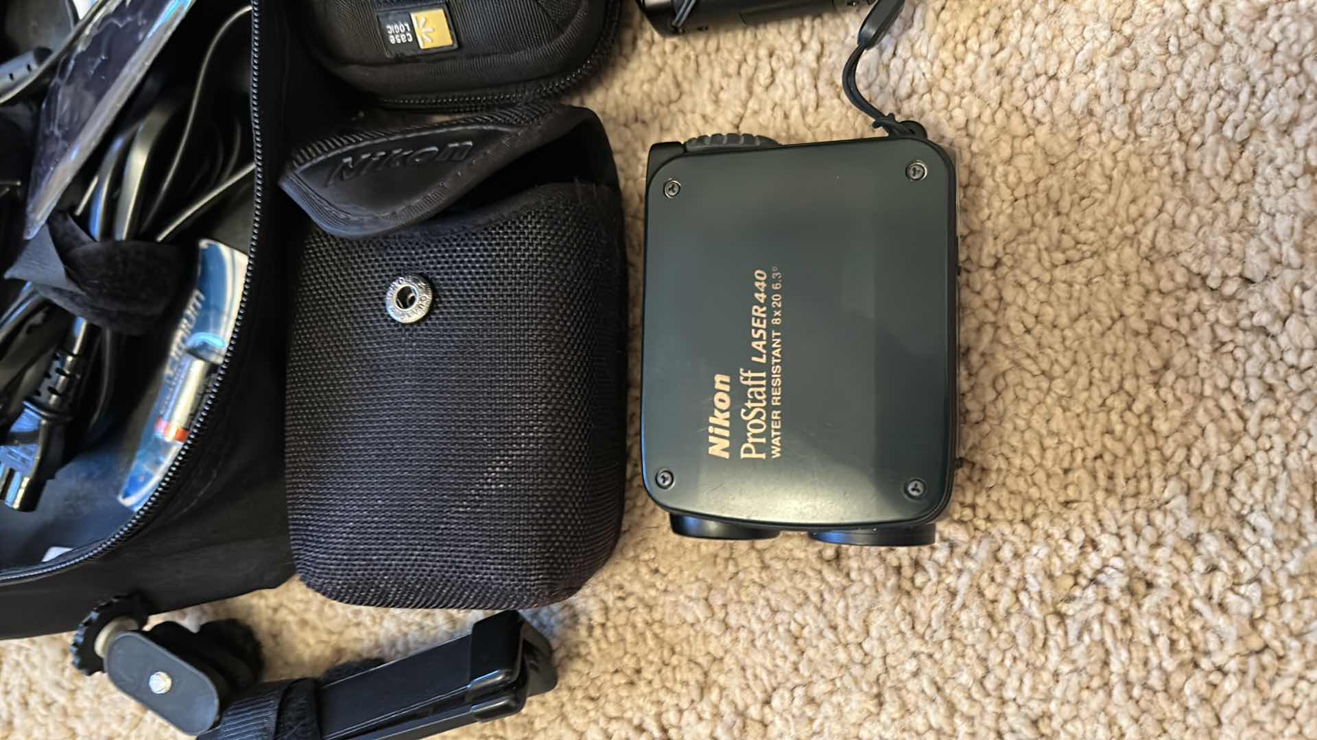 Photo 1 of Lumix camera, Nikon, Prostaff, laser carrying case, tripod, and accessories