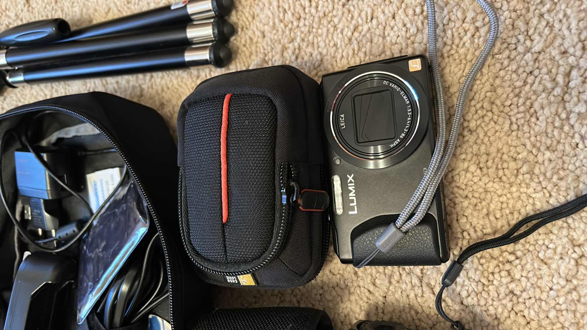 Photo 1 of Lumix camera, Nikon, Prostaff, laser carrying case, tripod, and accessories